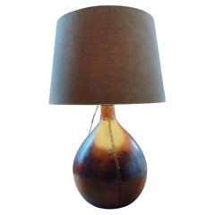 Leather wrapped glass lamp