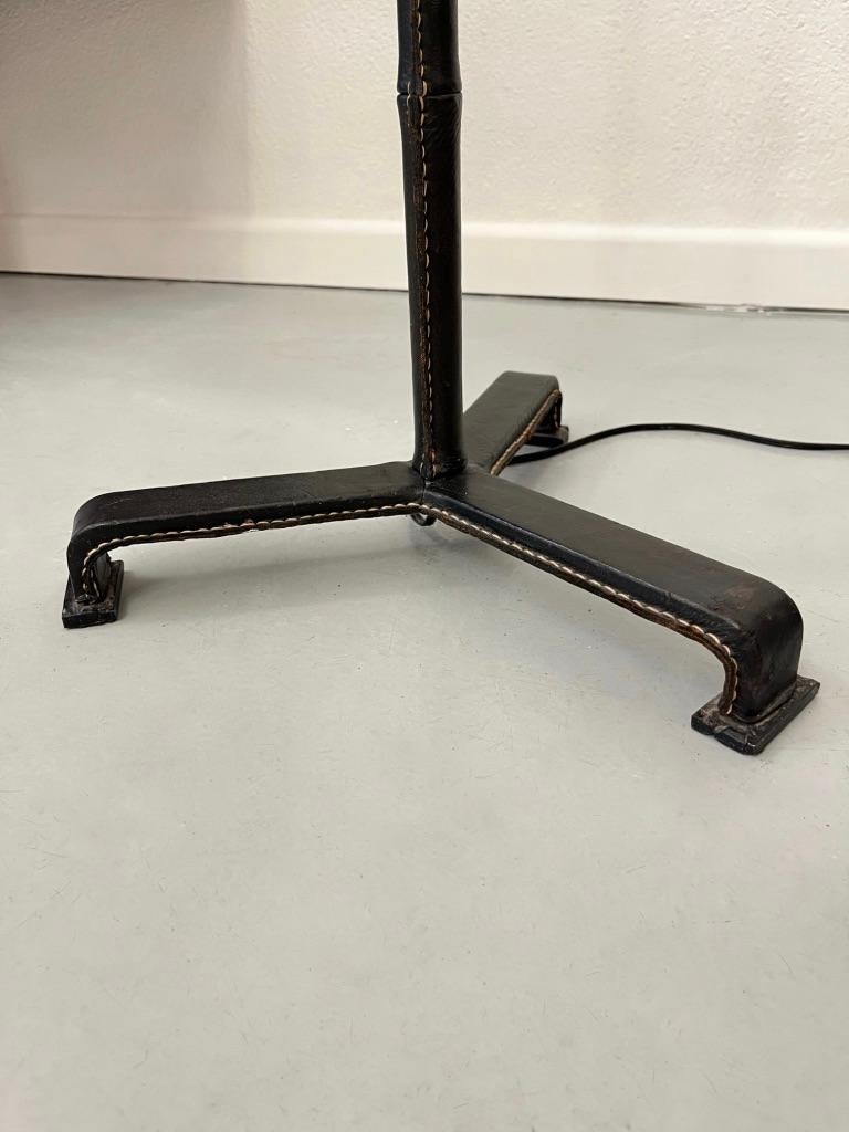 French Leather Wrapped Tripod Standing Lamp by Jacques Adnet, France circa 1950 For Sale