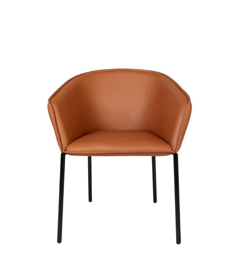 Leather You chaise chair by Luca Nichetto 
Materials: Structure in black lacquered metal, seat covered with fabric or leather
Technique: Lacquered metal. 
Dimensions: 63 x 57 x H 74 cm
Also available are upholstered different fabrics and also