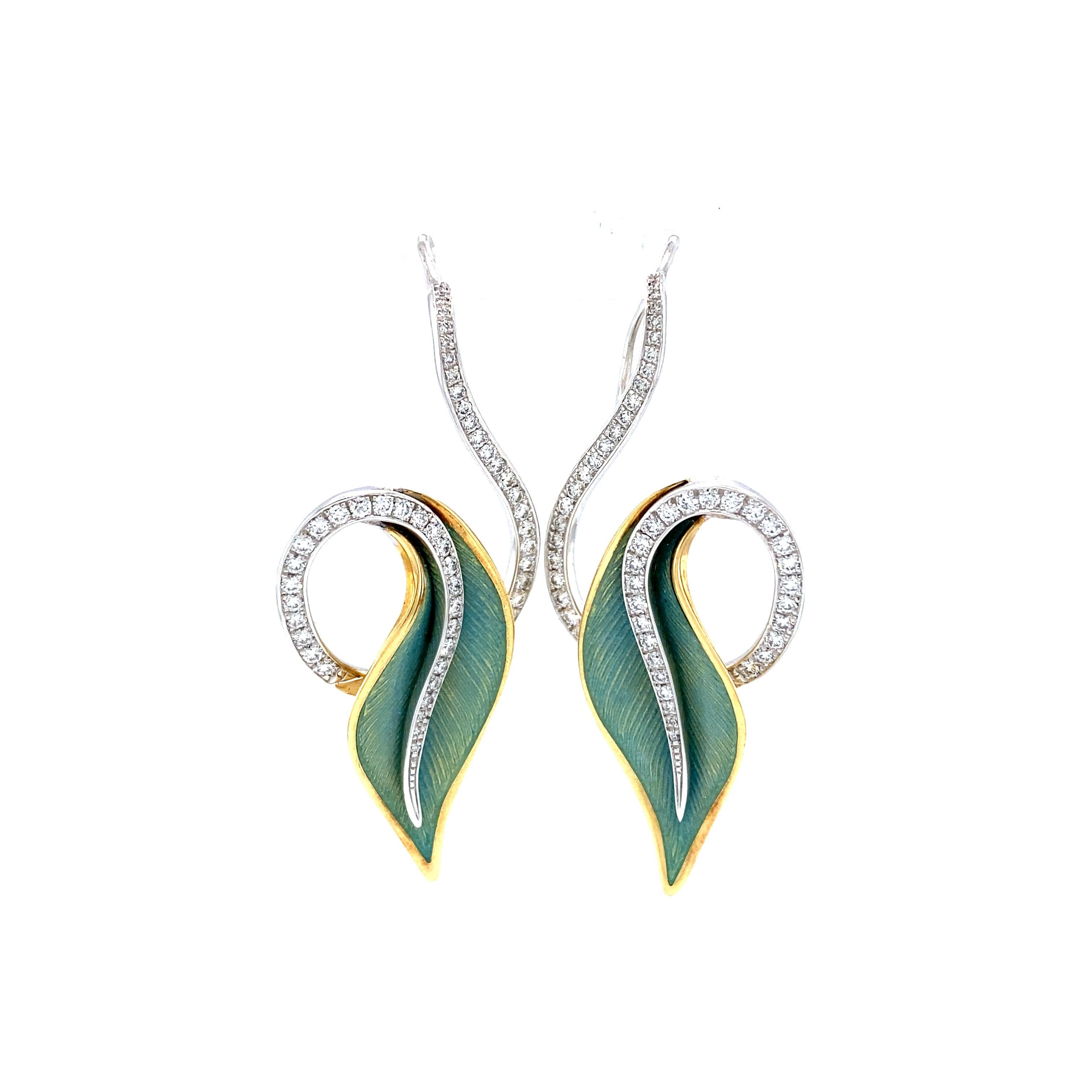 Victor Mayer leave shaped earrings 18k White Gold and Yellow Gold, Serenade collection, translucent opalescent turquoise vitreous enamel, 102 diamonds, total 0.86 ct, G VS, brilliant cut, measurements  app. 43 mm x 20 mm

About the creator Victor