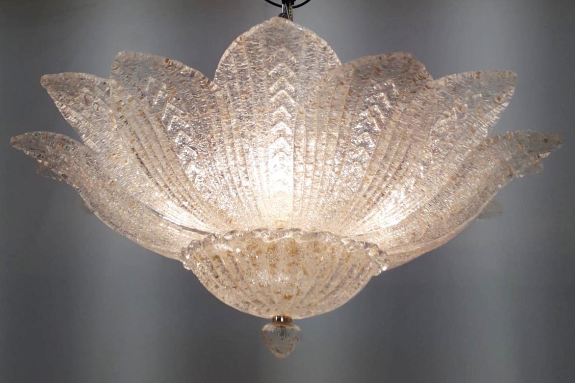 Italian flush mount with clear Murano glass leaves hand blown with amber graniglia to create golden effect, mounted on 24-karat gold-plated metal finish frame by Fabio Ltd / Made in Italy
5 lights / E12 or E14 type / max 40W each
Measures: Diameter