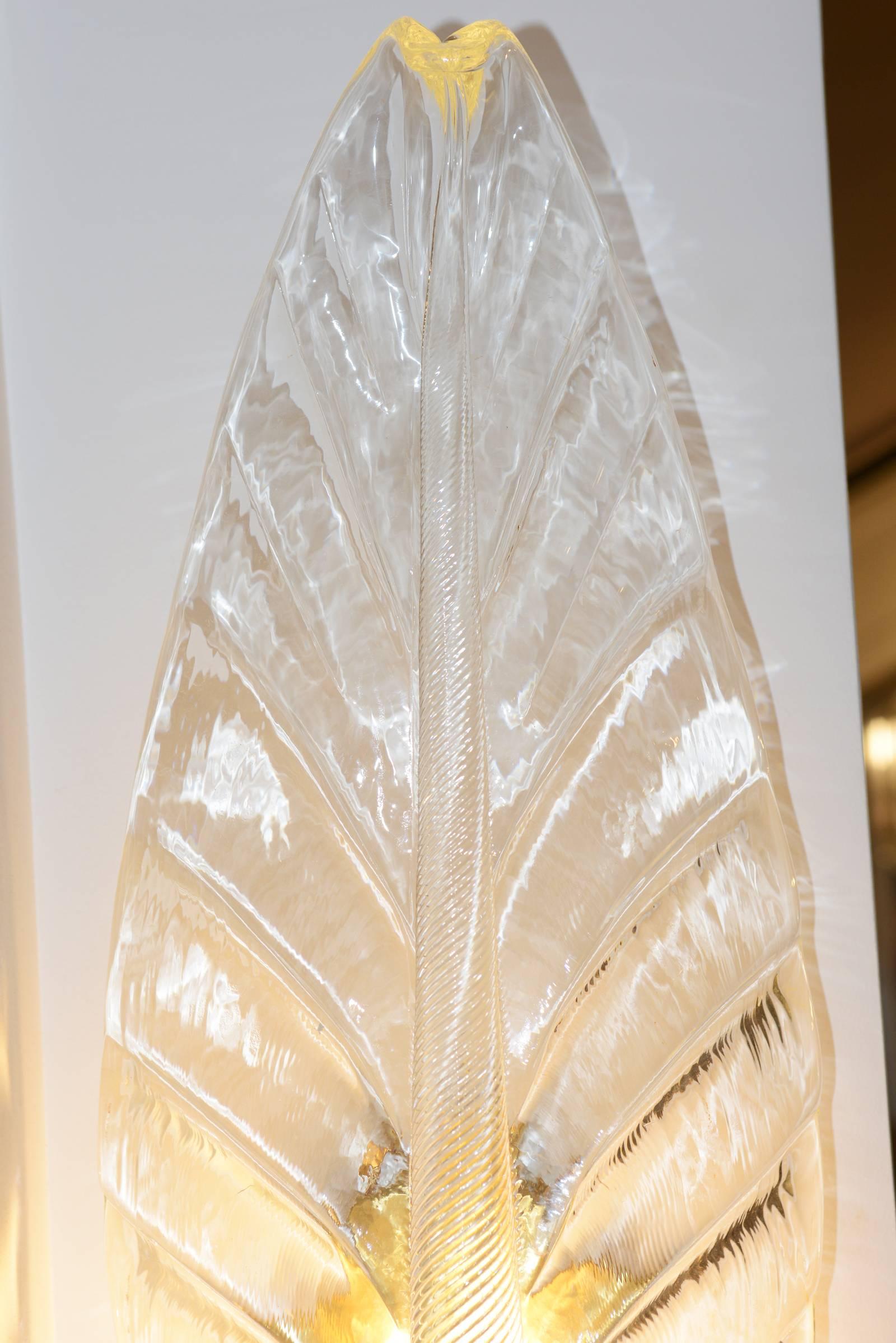 Wall light leaves set of two in pure handcrafted
Murano crystal glass. Art Deco style. Exceptional piece.
Measures: L 24 x D 17.5 x H 67.5cm/piece.
Unit price: 2900,00€
Set of two price: 5800,00€.
 