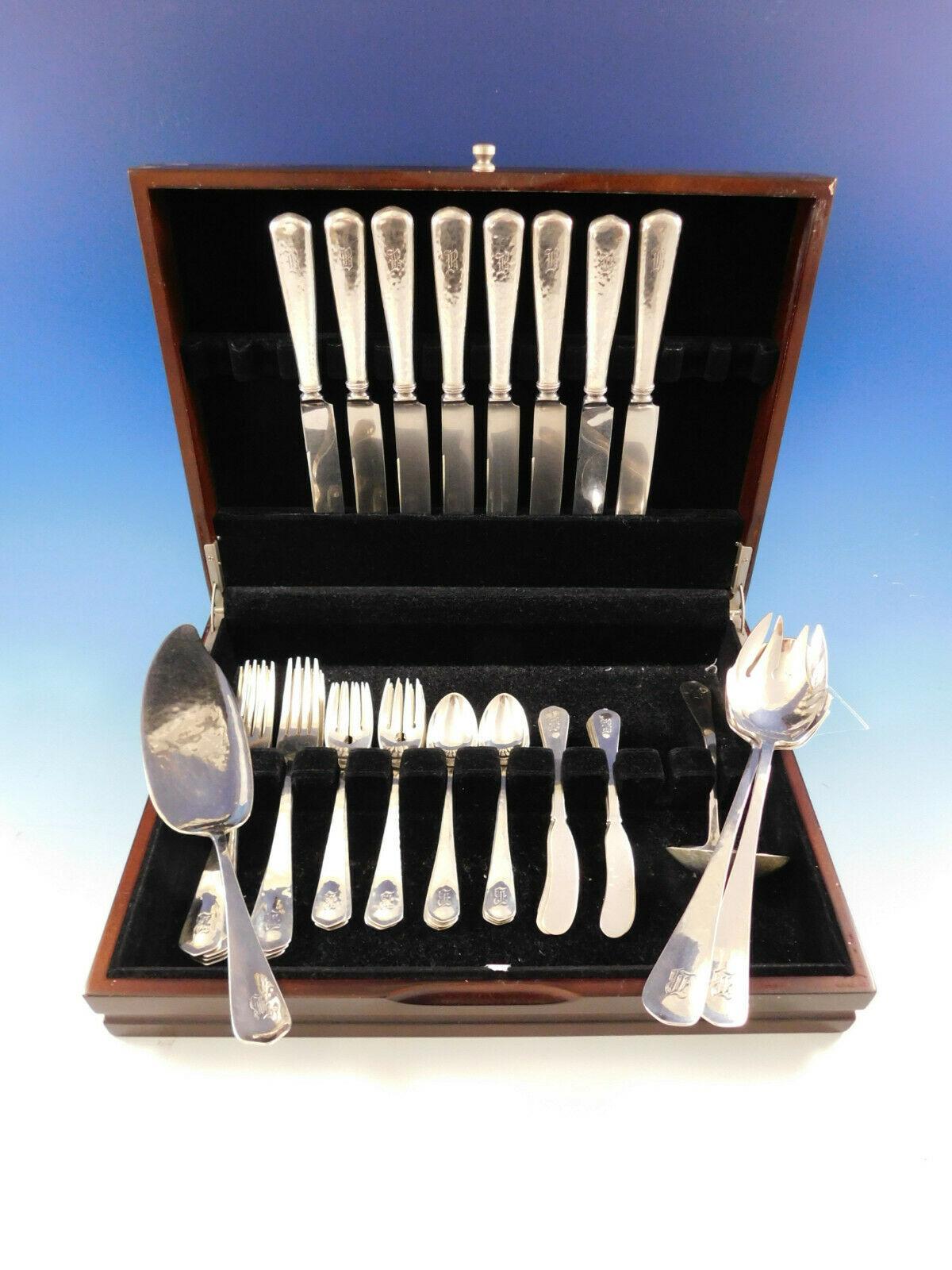 Superb Lebolt handwrought Chicago Arts & Crafts sterling silver flatware set - 44 pieces. This set is beautifully hand-hammered. This set includes:

8 dinner size knives, 9 5/8