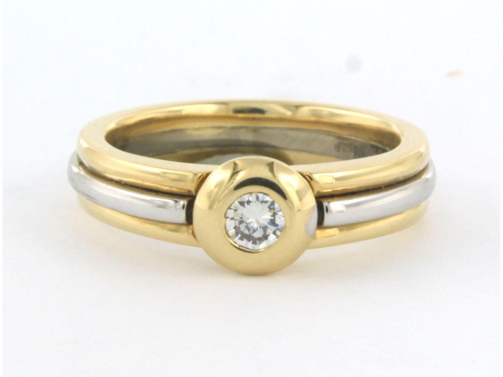 LECHIC 18K bicolor ring set with brilliant cut diamonds up to. 0.15ct - F - VS - ring size U.S. 5.25 - EU 16(50)

detailed description:

the top of the ring is 6.5 mm wide

weight 7.0 grams

ring size U.S. 5.25 - EU 16(50)

occupied with

- 1 x 3.5
