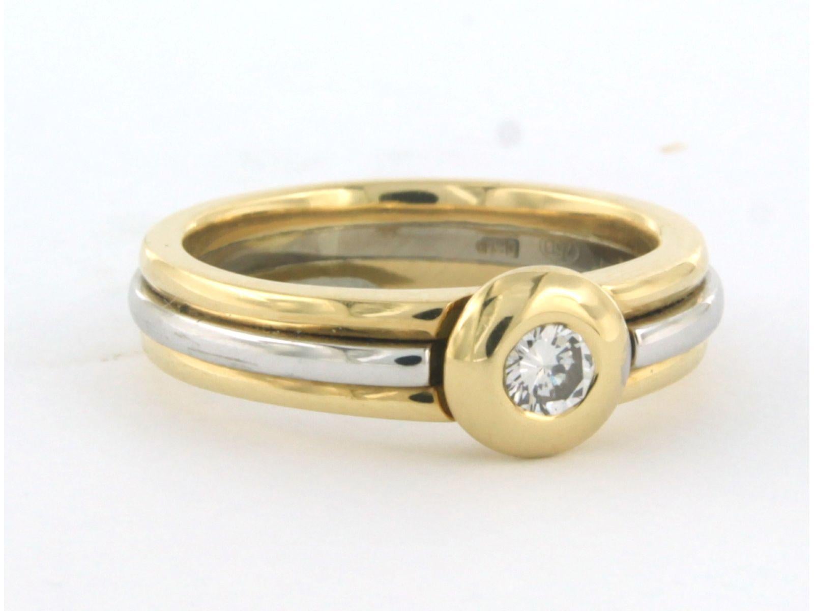 LECHIC Bague bicolore 18K sertie de diamants taille brillant jusqu'à. 0.15ct - F - VS - taille 5.25(16/50)

description détaillée :

le haut de l'anneau a une largeur de 6.5 mm

poids 7,0 grammes

bague taille 5.25(16/50)

occupé par

- 1 diamant