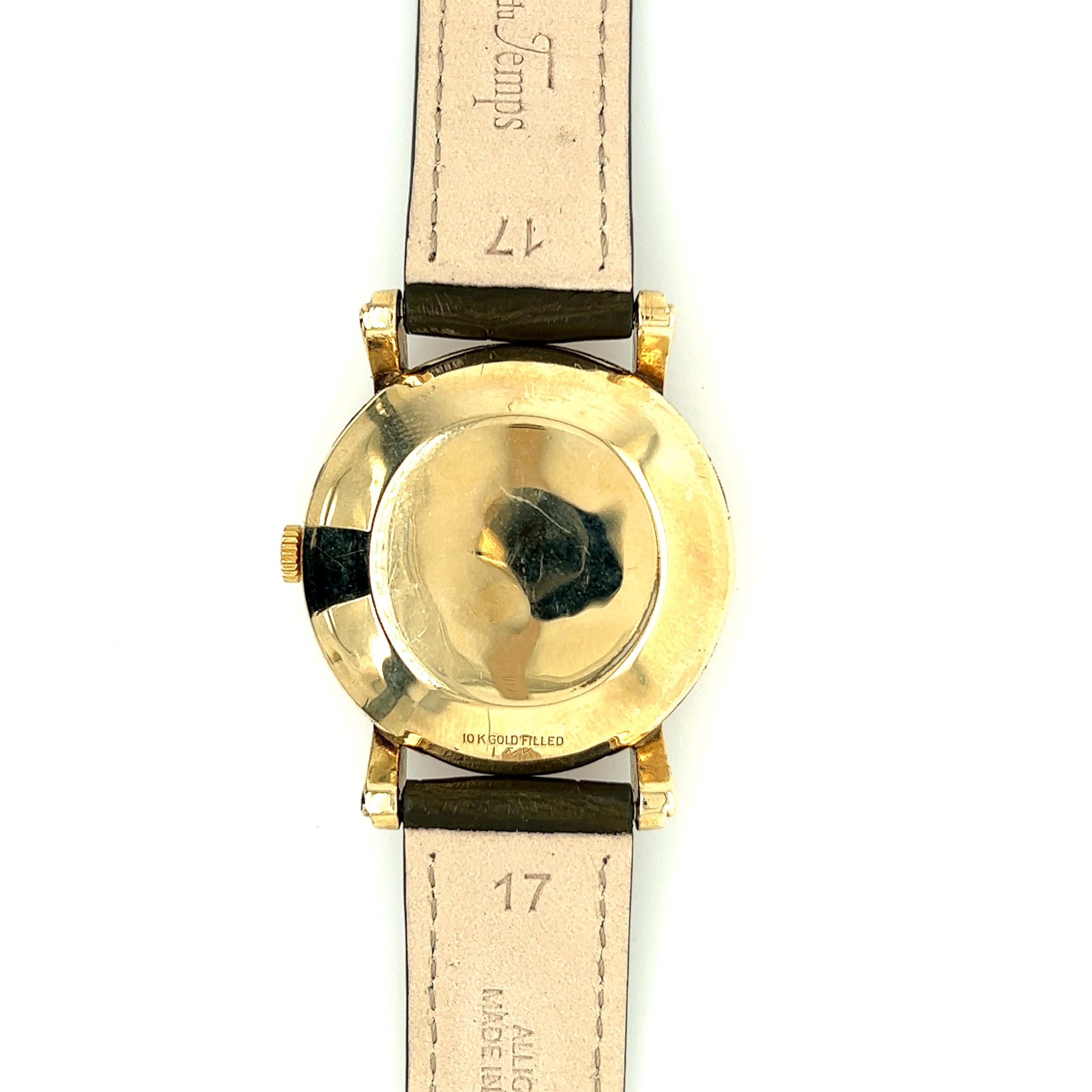 LeCoultre & Cie Vintage Watch Power Reserve White Dial Yellow Gold Plated Case 

This Lecoultre & Cie men's watch is an outstanding example of Swiss watchmaking excellence. With a 10 carat yellow gold plated case and a made in France bracelet, this