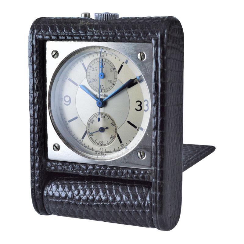 FACTORY / HOUSE: LeCoultre Watch Company
STYLE / REFERENCE: Folding Chronograph Desk Clock
METAL / MATERIAL: Leather 
CIRCA / YEAR: 1940's
DIMENSIONS / SIZE: 2-3/8 X 1-3/4  OR 60cm X 45cm
MOVEMENT / CALIBER: Manual Winding / 17 Jewels / Caliber 72