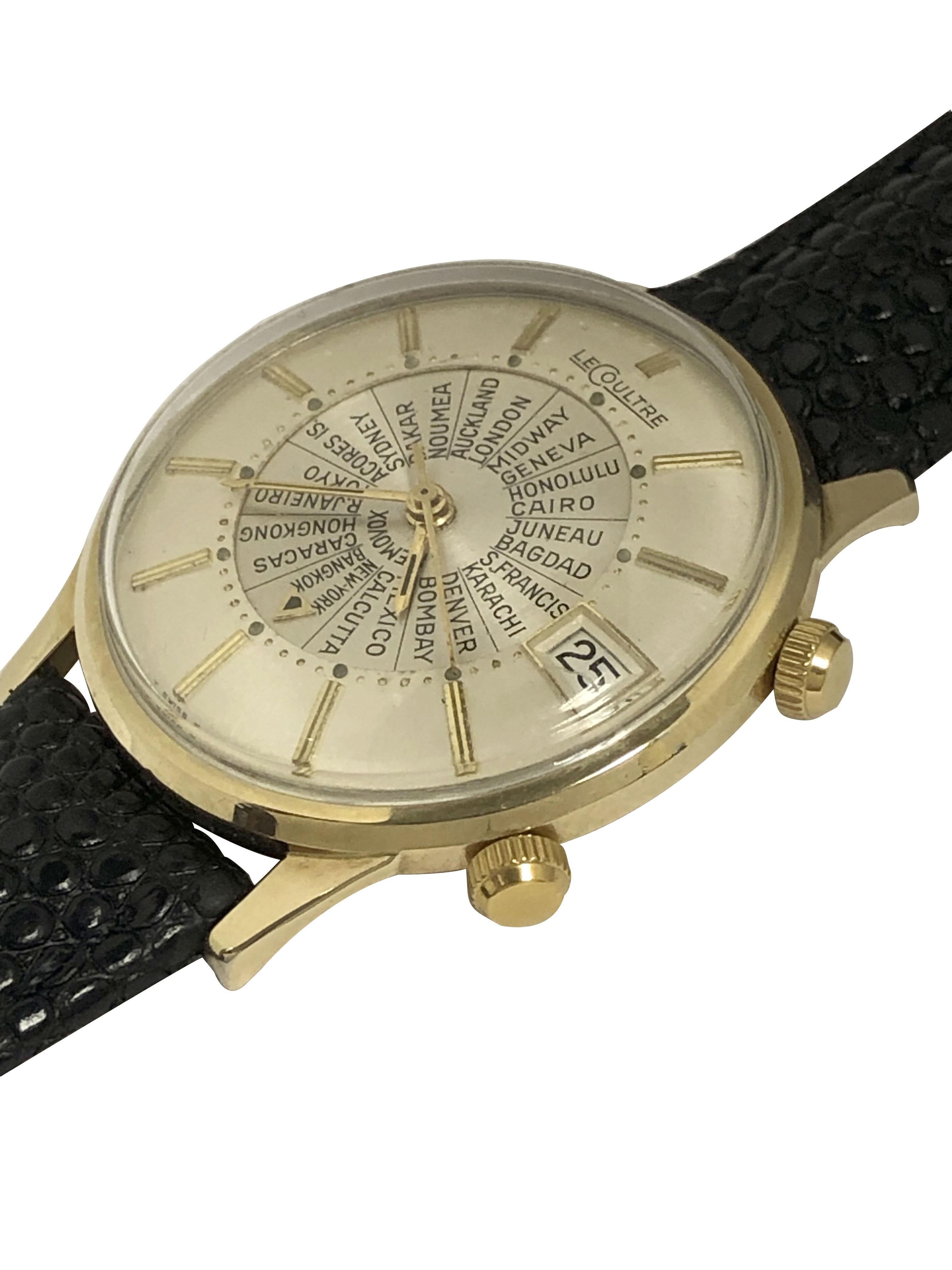 Circa 1960 Jaeger LeCoultre World Time Memovox Alarm Wrist Watch, 32 M.M. 2 piece Gold Filled Case. Caliber JLC K825 Automatic, Self Winding movement with Alarm Function Original Mint condition 2 Tone Silver Satin dial with inner rotating World