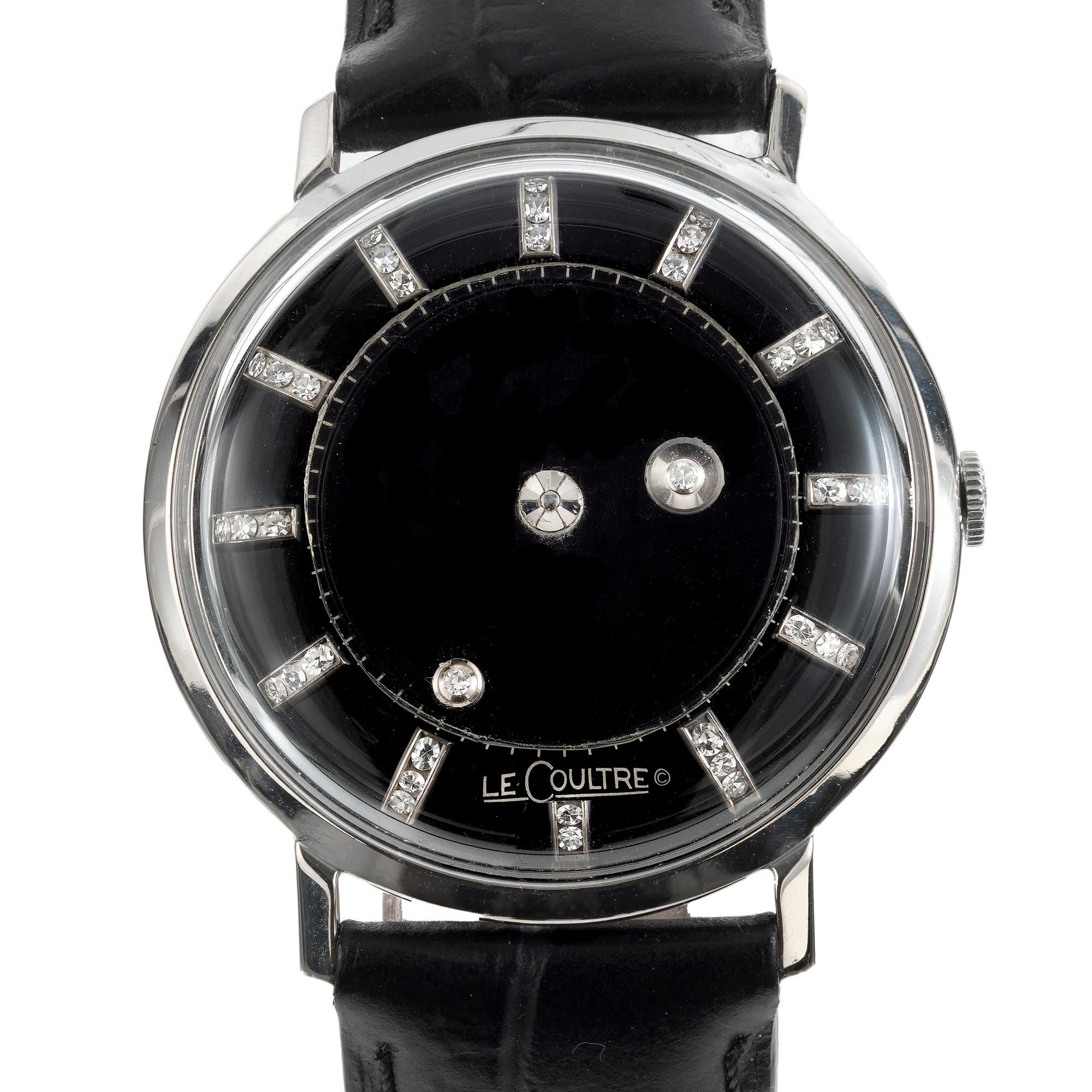 Mid-Century 1950's LeCoutre Vacheron White Gold Galaxy Mystery Dial Wristwatch. The black unique mystery dial features double diamond markers, set in white gold.  as if a galaxy were trapped within. The sleek and minimalistic design is enhanced by