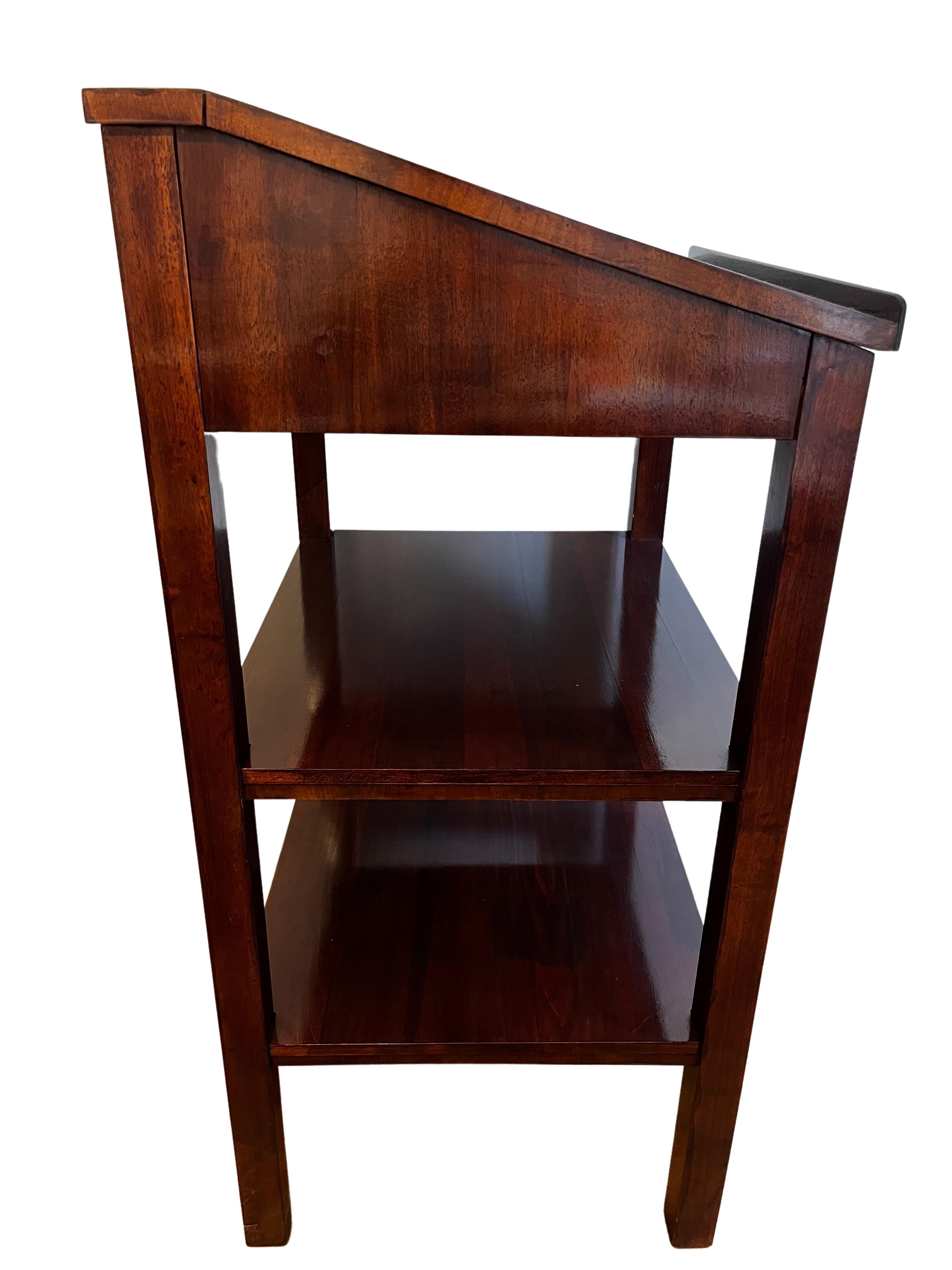 Stunning Lectern, in the Biedermeier style from the end of the 19th century, made around 1870.

A wonderful example of a speaking desk, finished in cherry wood but stained to mahogany. It is built on 3 levels, with 2 shelves and at the top there is