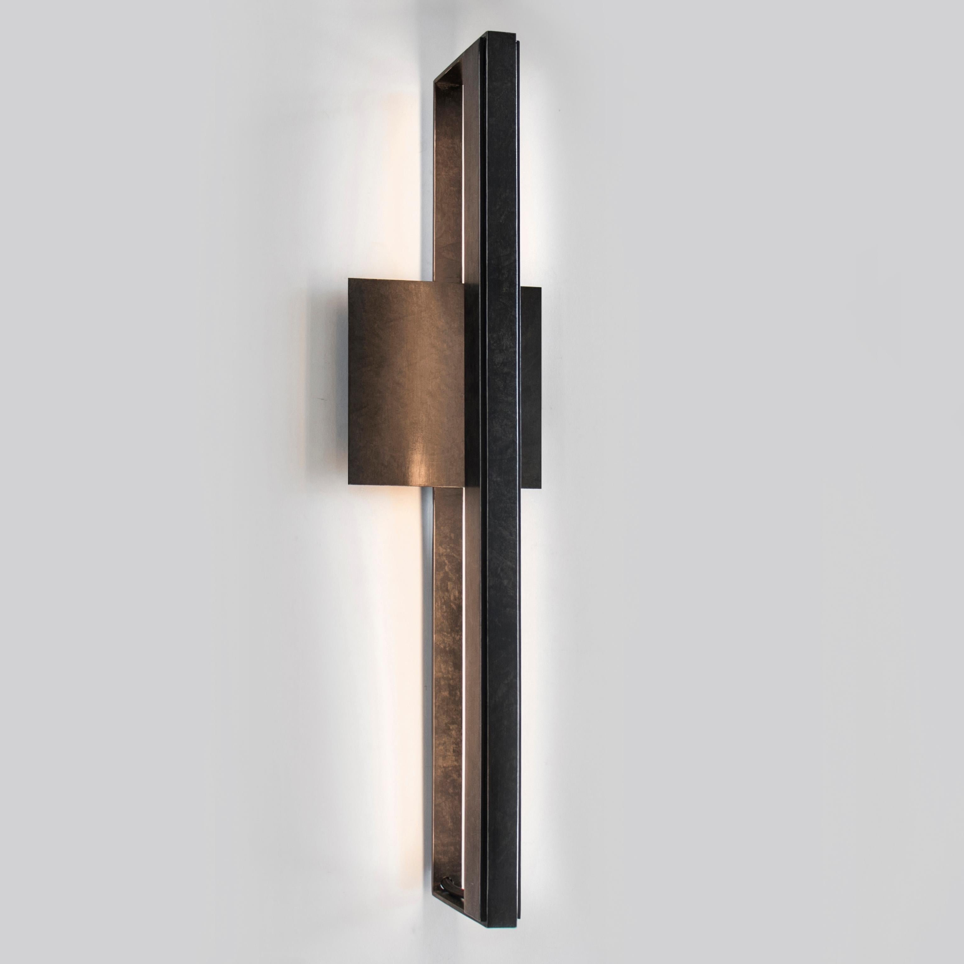 The bar wall sconce is an elegant fixture that is built of cold-rolled steel, with an LED light source. The simplicity of the sconce makes it a perfect choice for bathroom vanities, dining rooms, living rooms, master bedrooms, and