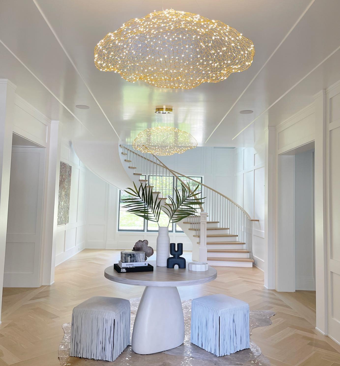 In the LED cloud Light, hundreds of small LED lights are combined to a handmade  wire mesh to create an elegant floating cloud chandelier light or pendant.
Six LED lights are mounted on the canopy.
Dimmable. Three standard sizes.
Finishes: Gold or