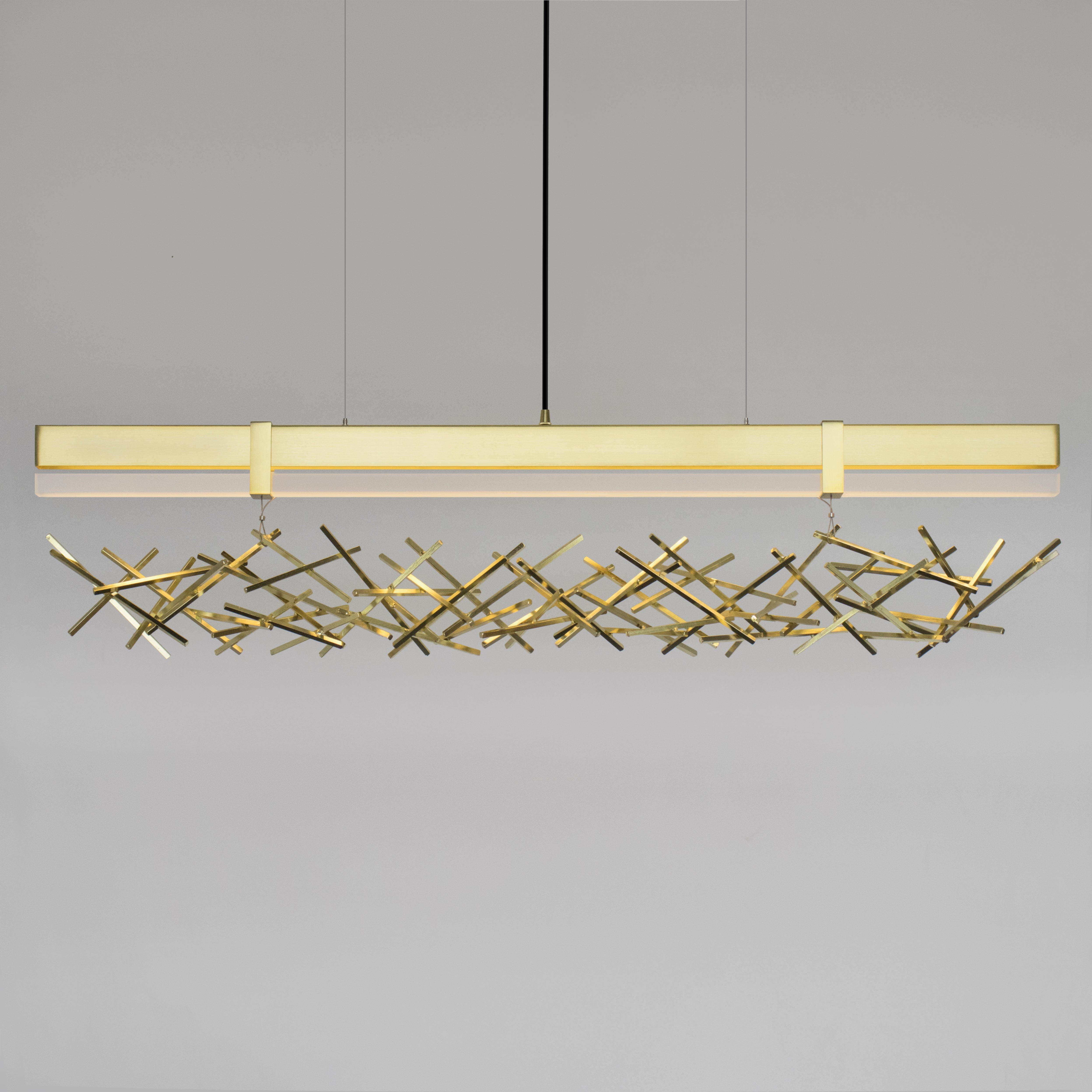 The LEVEL/ CRISS-CROSS Pendant is built of cold-rolled steel with an LED light source that is diffused by a satin hand-rubbed acrylic diffuser. The CRISS-CROSS element is suspended below as a decorative sculpture. This pendant works as an individual