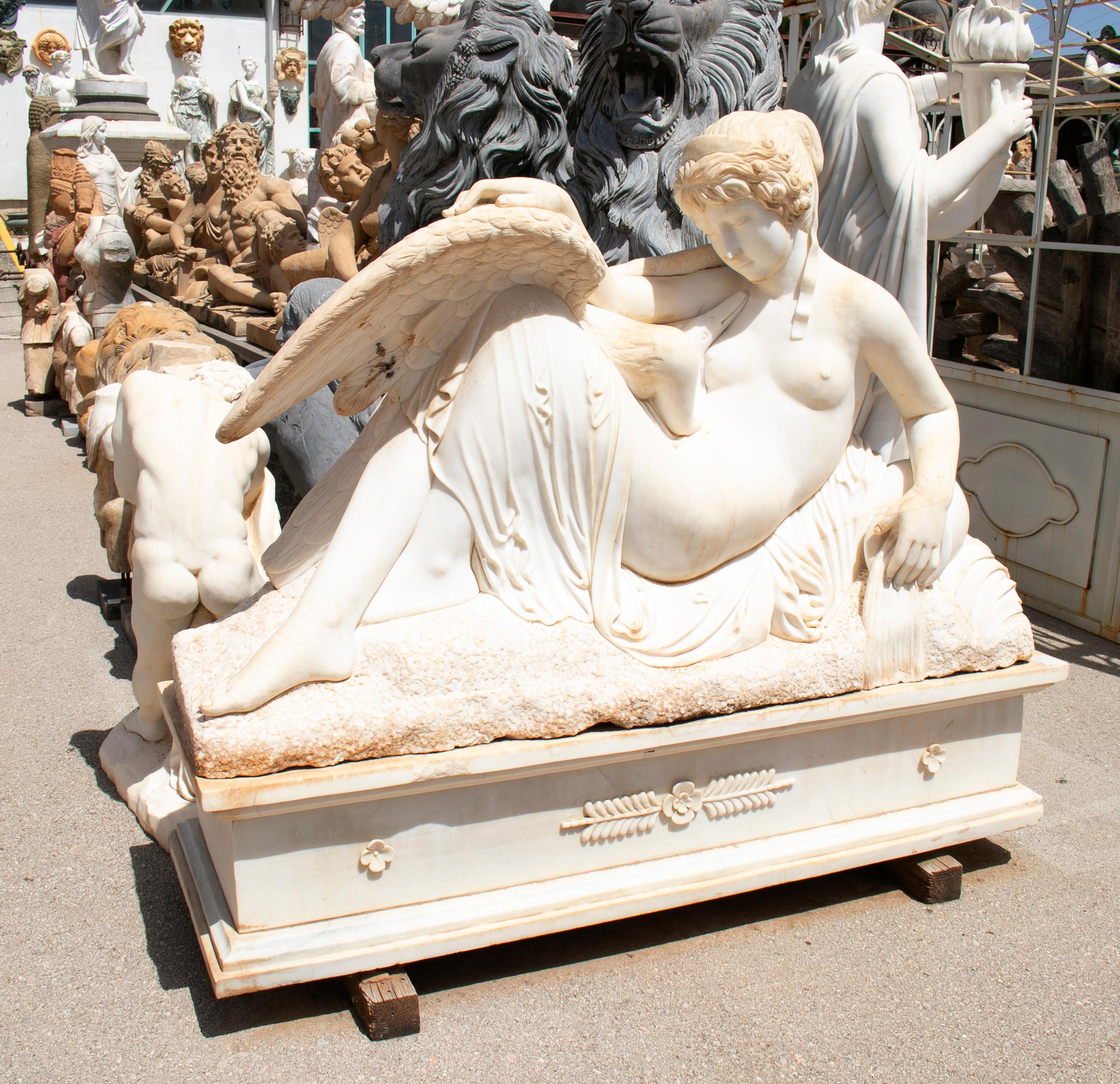 Leda and the Swam hand carved life-size white marble sculpture with base.