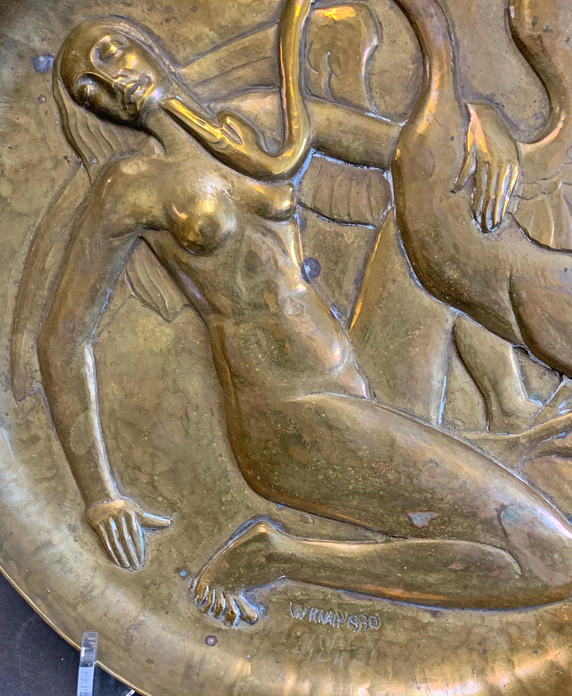 One of the finest repoussé bronze sculptures we have ever offered, this high style Art Deco bas relief rondel was made in 1930 by Willi Knapp. Knapp was born in Germany and came to America at age 22, first working in Chicago before settling in