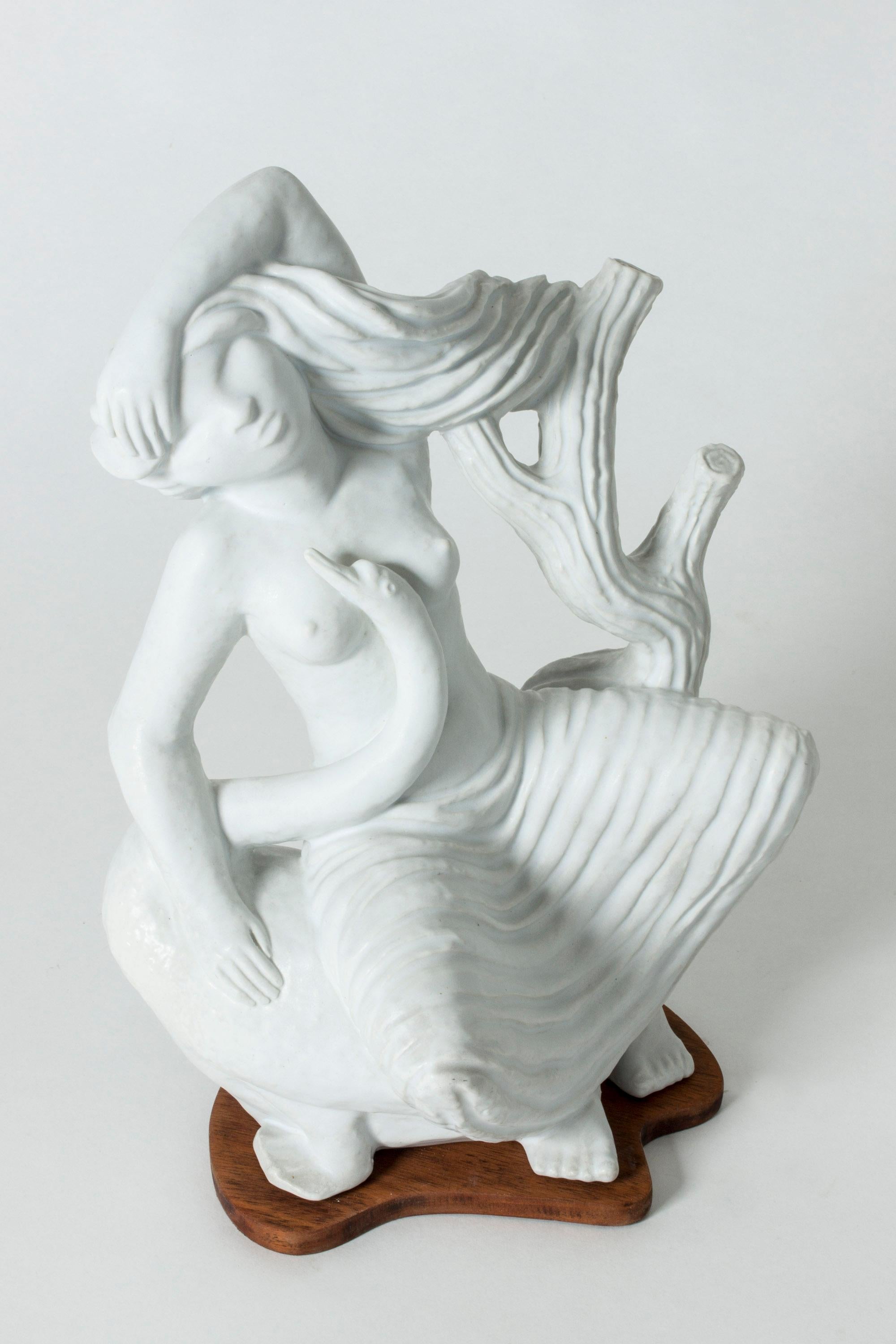 Stunning stoneware sculpture by Stig Lindberg, narrating the mythological story of Queen Leda and the Swan. Beautiful attention to detail and expressiveness in Leda’s face, flowing hair and posture.
The sculpture was made in Gustavsberg’s Studio