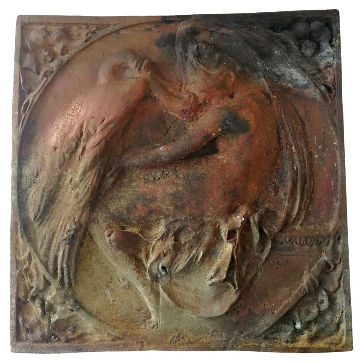 Spectacular bronze relief that represents the Greek motif of Leda and the swan, according to which Zeus descended from Olympus in the form of a swan towards Leda, while this queen was walking along the Eurotas river. This bronze has a patina that