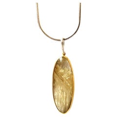 Leda Jewel Co Pendentif breloque ovale allongé en quartz rutile doré 