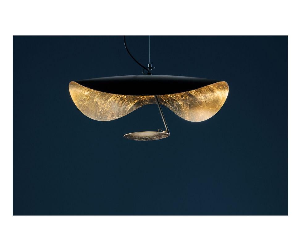 Lederam embodies the accuracy of the motion required to draw a line. The warm, softly colored disks surround a LED module with an ultra-flat shape, which creates thin lamps and suspended forms with curved, sinuous lines.

Finish: Shade black/gold,