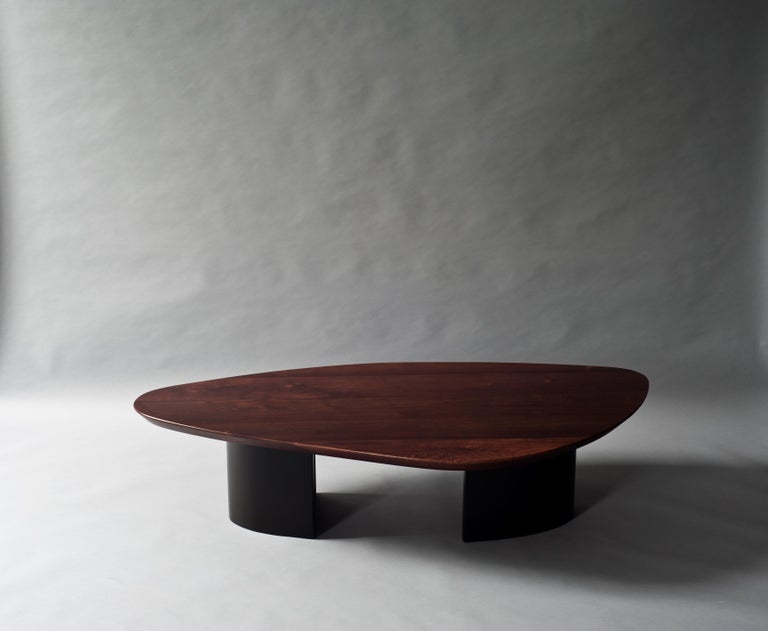 Ledge coffee table by DeMuro Das 
Dimensions: W 80 x D 150 x H 35 cm
Materials: Solid walnut - Matte
 Lacquer (Grey Olive) - Matte


Dimensions and finishes can be customized.

DeMuro Das is an international design firm and the aesthetic and