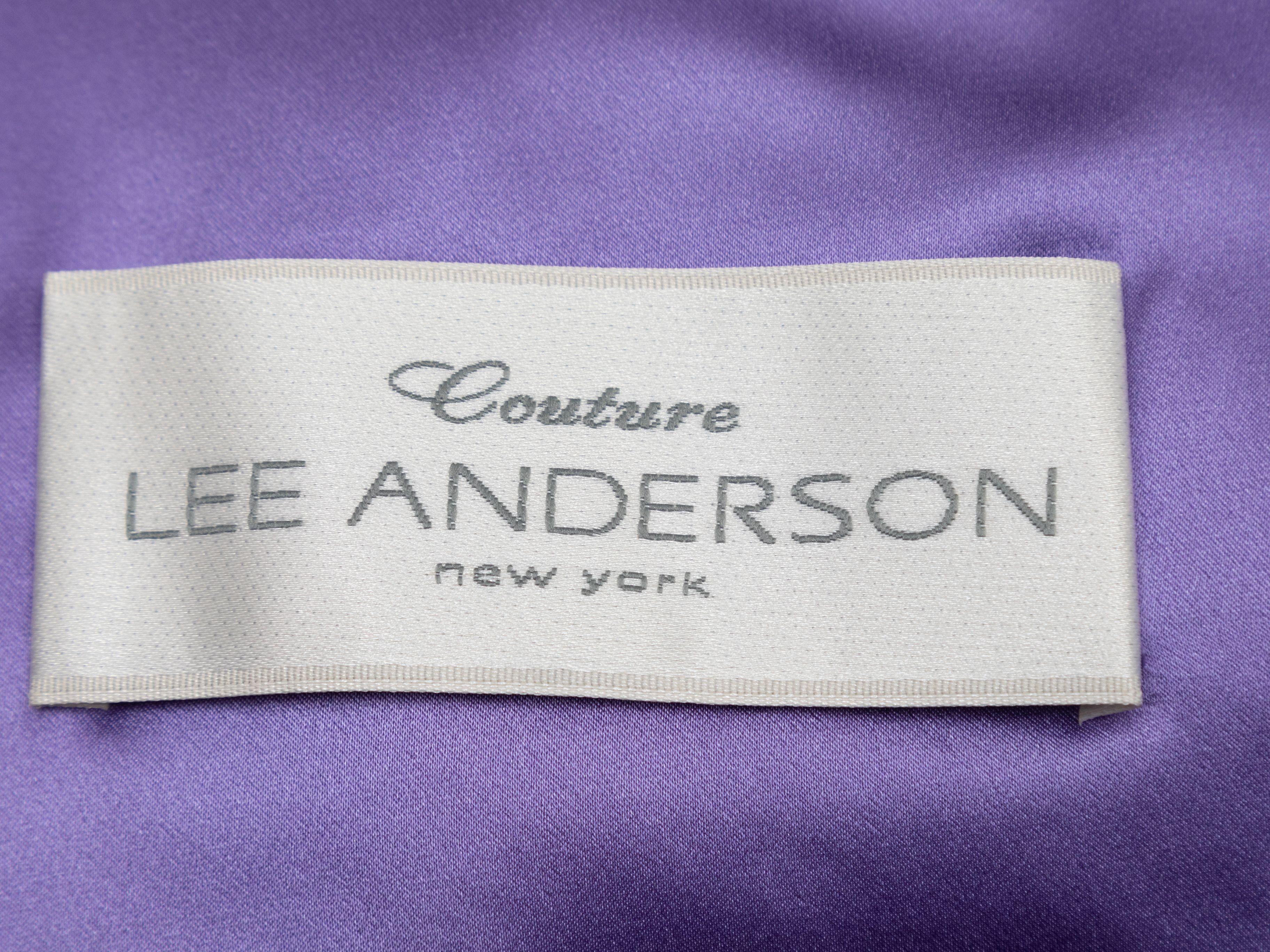 Product Details: Green jacquard dress by Lee Anderson Couture. V-neck. Short sleeves. Zip closure at back. 38