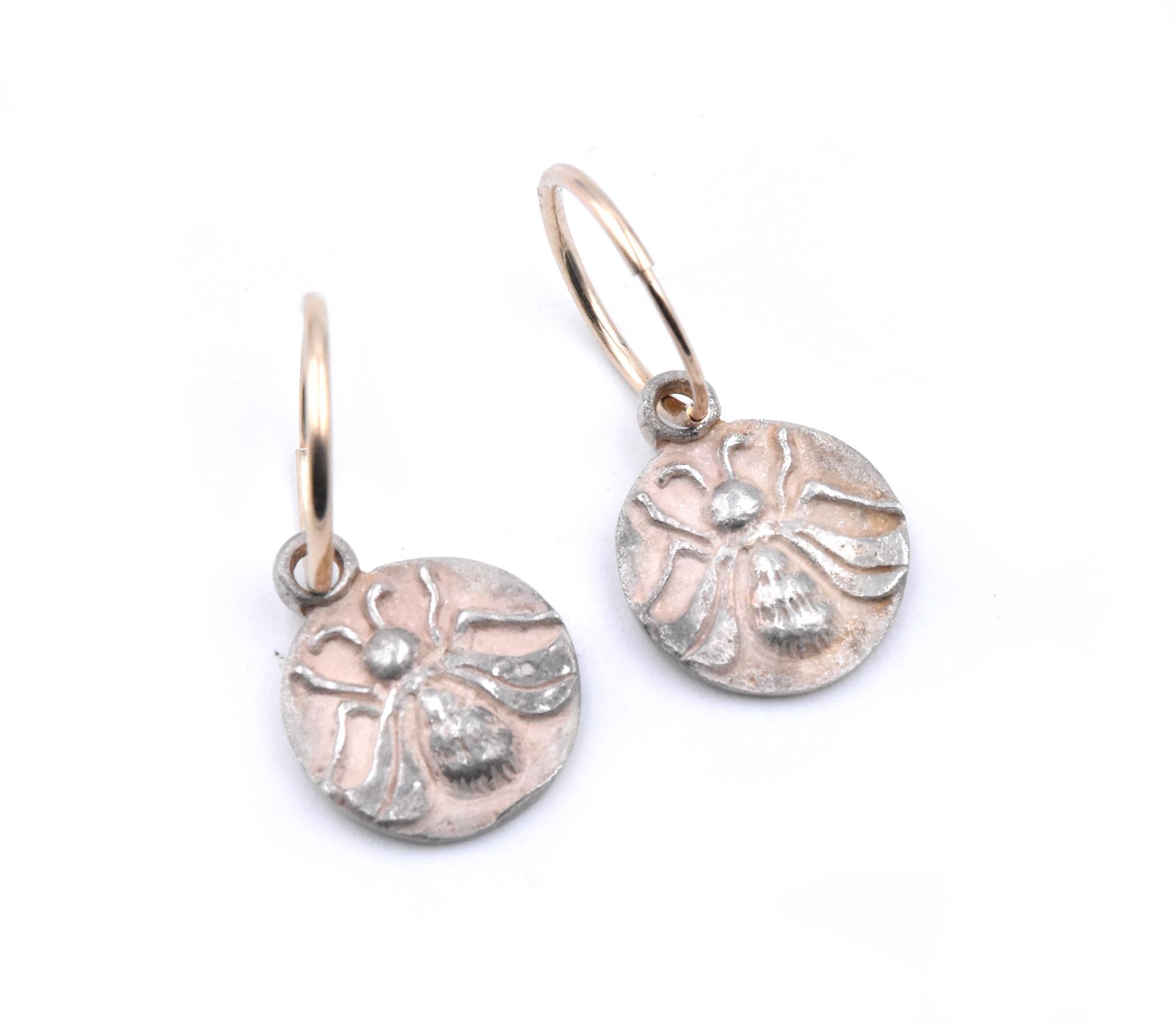 Designer: Lee Brevard
Material: 14K Yellow Gold and Sterling Silver
Dimensions: the earring measures 25.02 X 12.03mm
Weight: 2.96 grams
