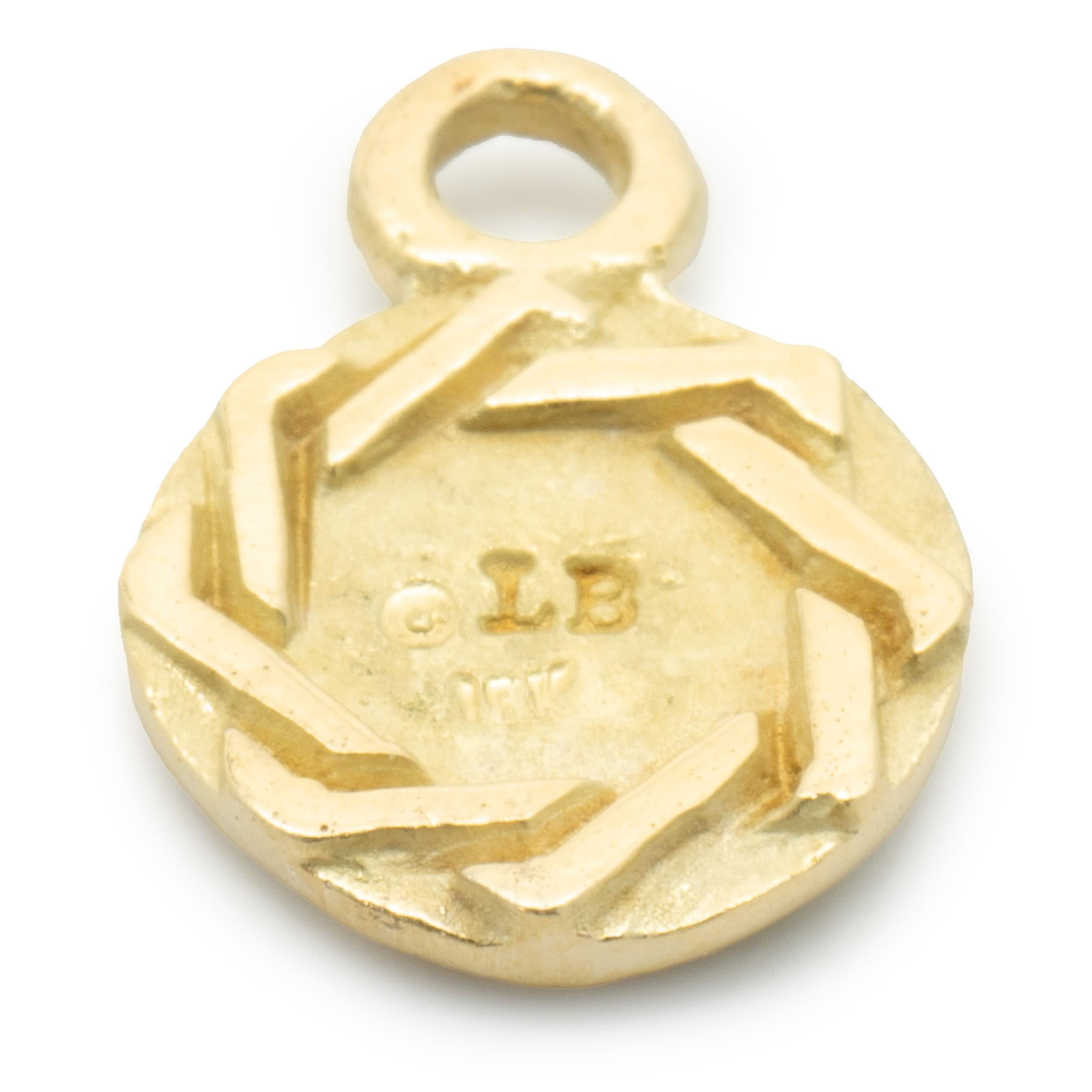 Designer: Lee Brevard
Material: 18K yellow gold  
Dimensions: charm measures 16mm long
Weight: 2.05 grams