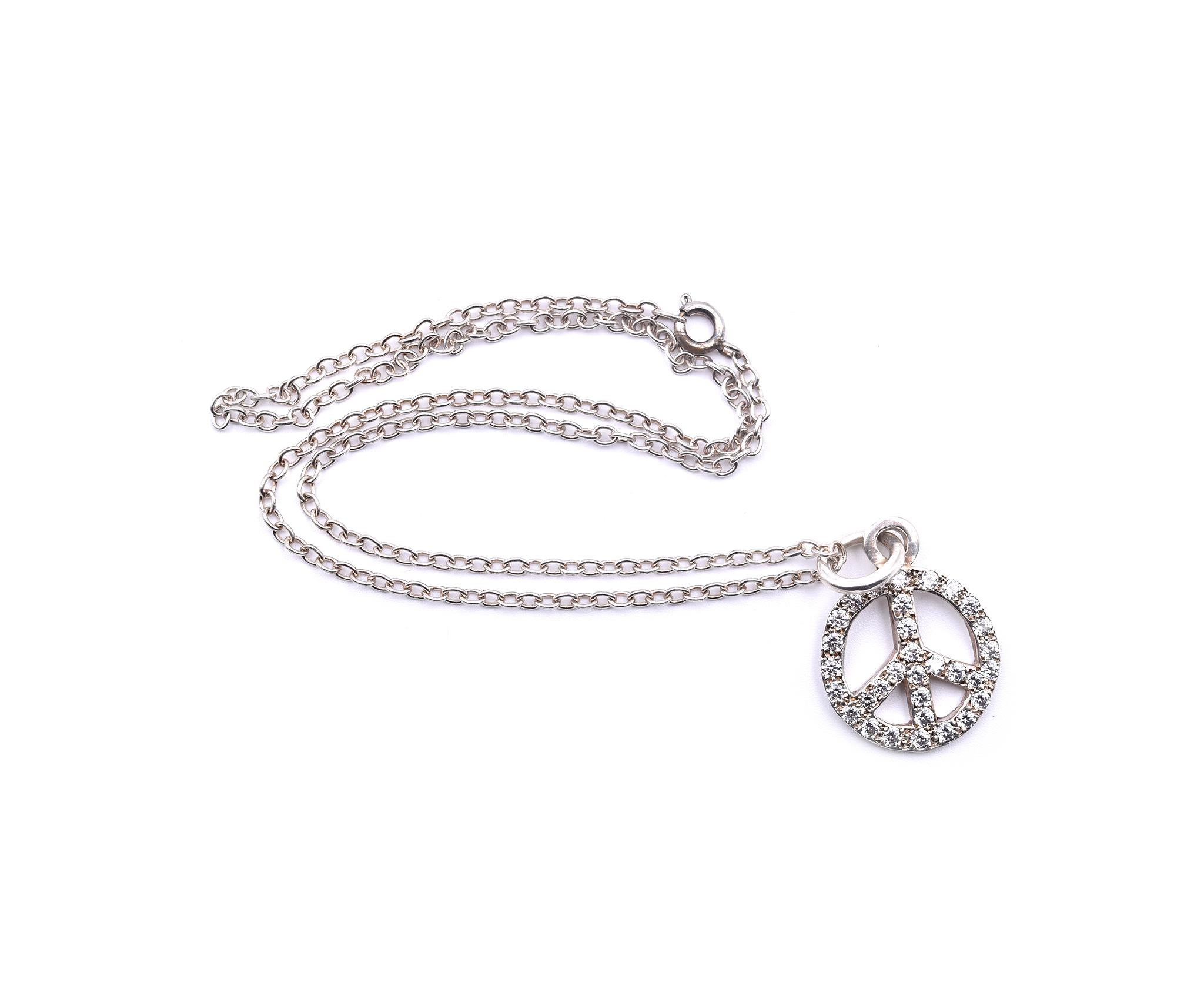 Designer: Lee Brevard
Material: sterling silver
Diamonds: 32 round brilliant cut= 2.00cttw
Color: G
Clarity: VS
Dimensions: necklace is 16-inches long, pendant is 1 ¼-inch long and approximately 20mm in diameter
Weight: 8.18 grams 
