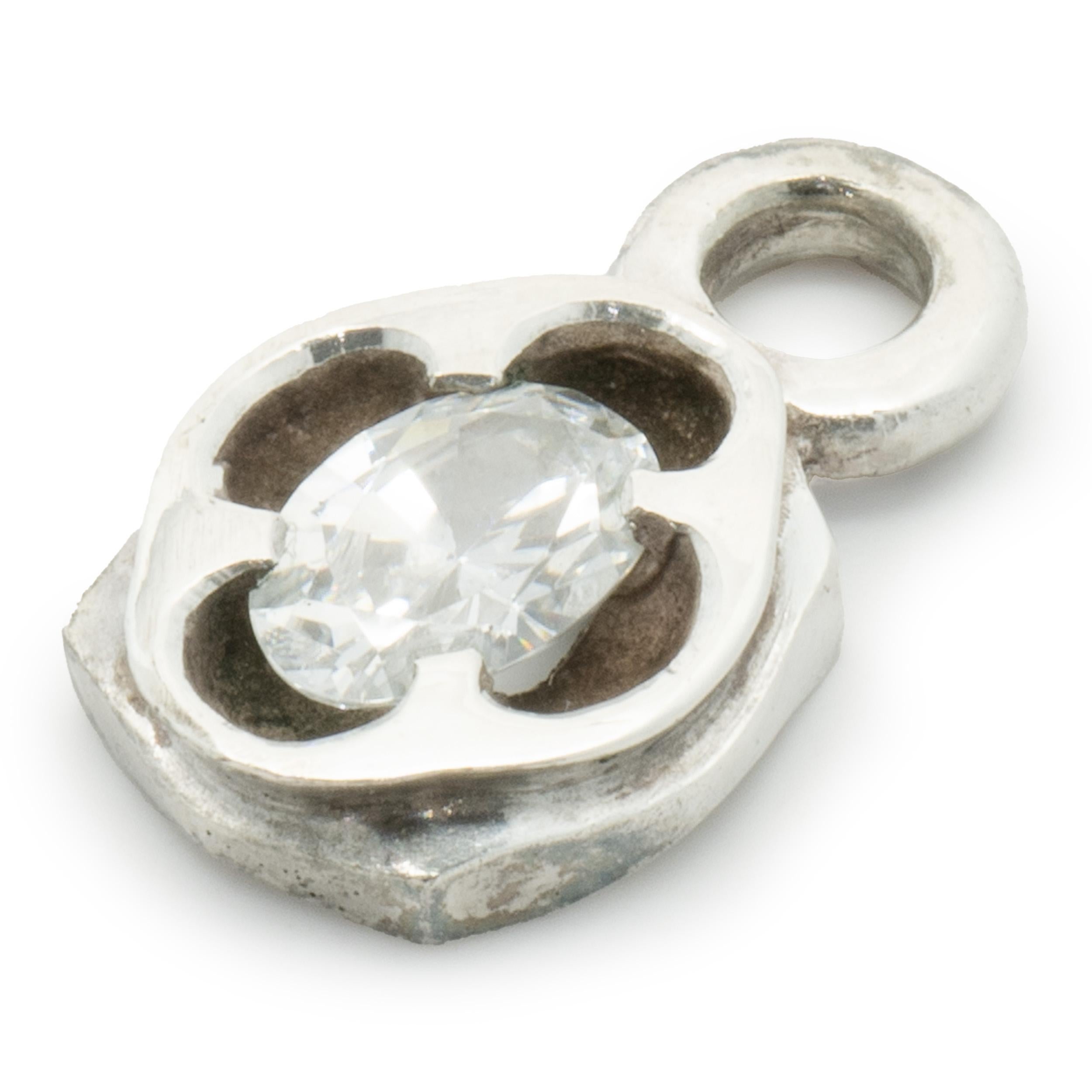 Designer: Lee Brevard
Material: sterling silver
Dimensions: charm measures 14.5mm long
Weight: 1.26 grams