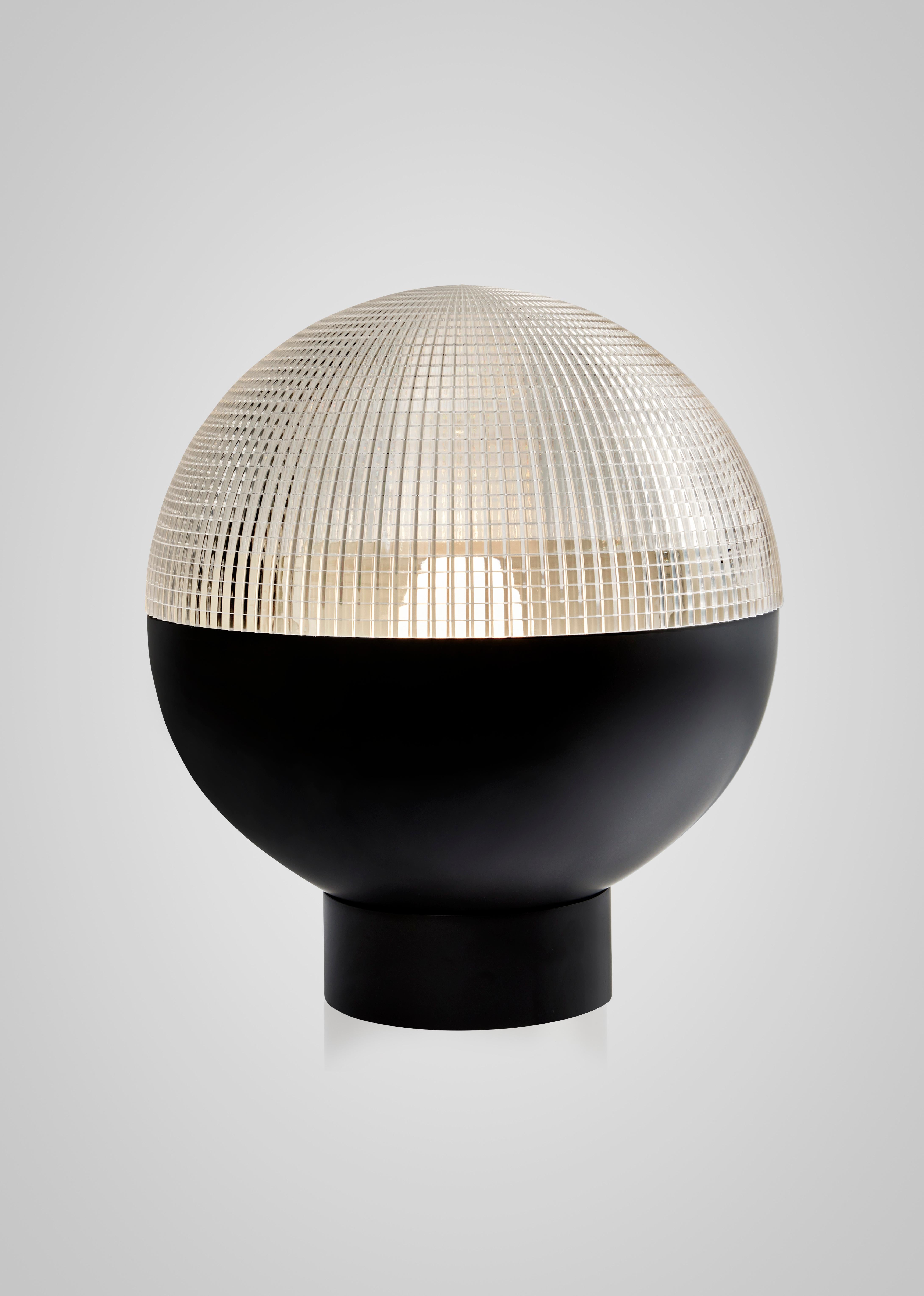 LENS FLAIR TABLE LAMP - Brushed Brass
Inspired by telescopic lenses and the art of horizontal and vertical refractions, Lens Flair is a piece of two halves, seamlessly combining the solid and the transparent. A detailed cross-cut lens emits a soft