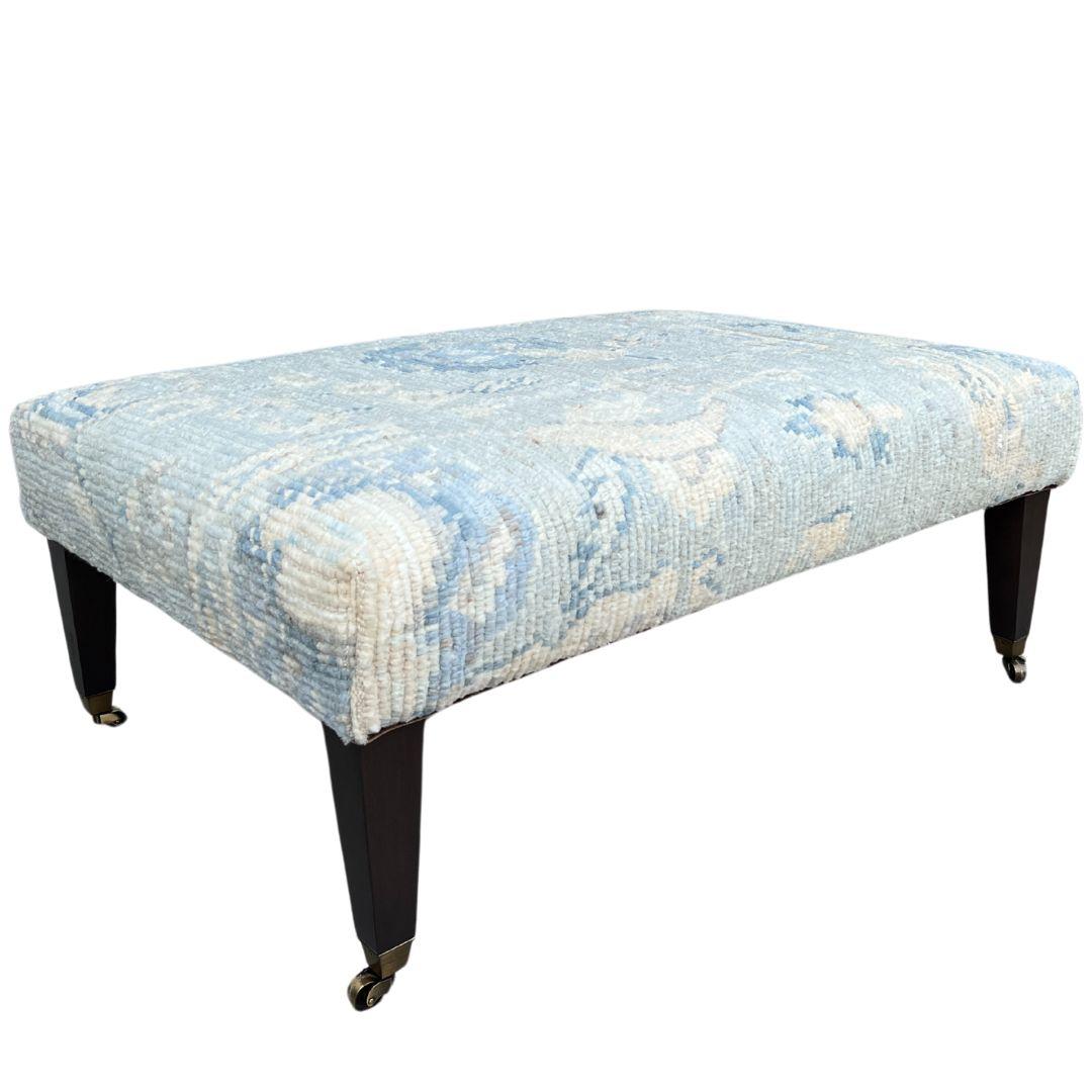 Lee Industries cocktail ottoman made from a vintage Turkish rug. This ottoman is a one-of-a-kind and completely unique - a guaranteed conversation starter. It makes for a stunning addition to family rooms, dens and bedrooms while functioning as