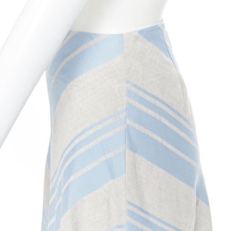 LEE MATTHEWS light grey blue striped linen cotton flared midi casual skirt US0
Reference: LNKO/A01627
Brand: Lee Mathews
Material: Linen, Cotton
Color: Grey, Blue
Pattern: Striped
Closure: Zip
Extra Details: Flared skirt. Matched stripe