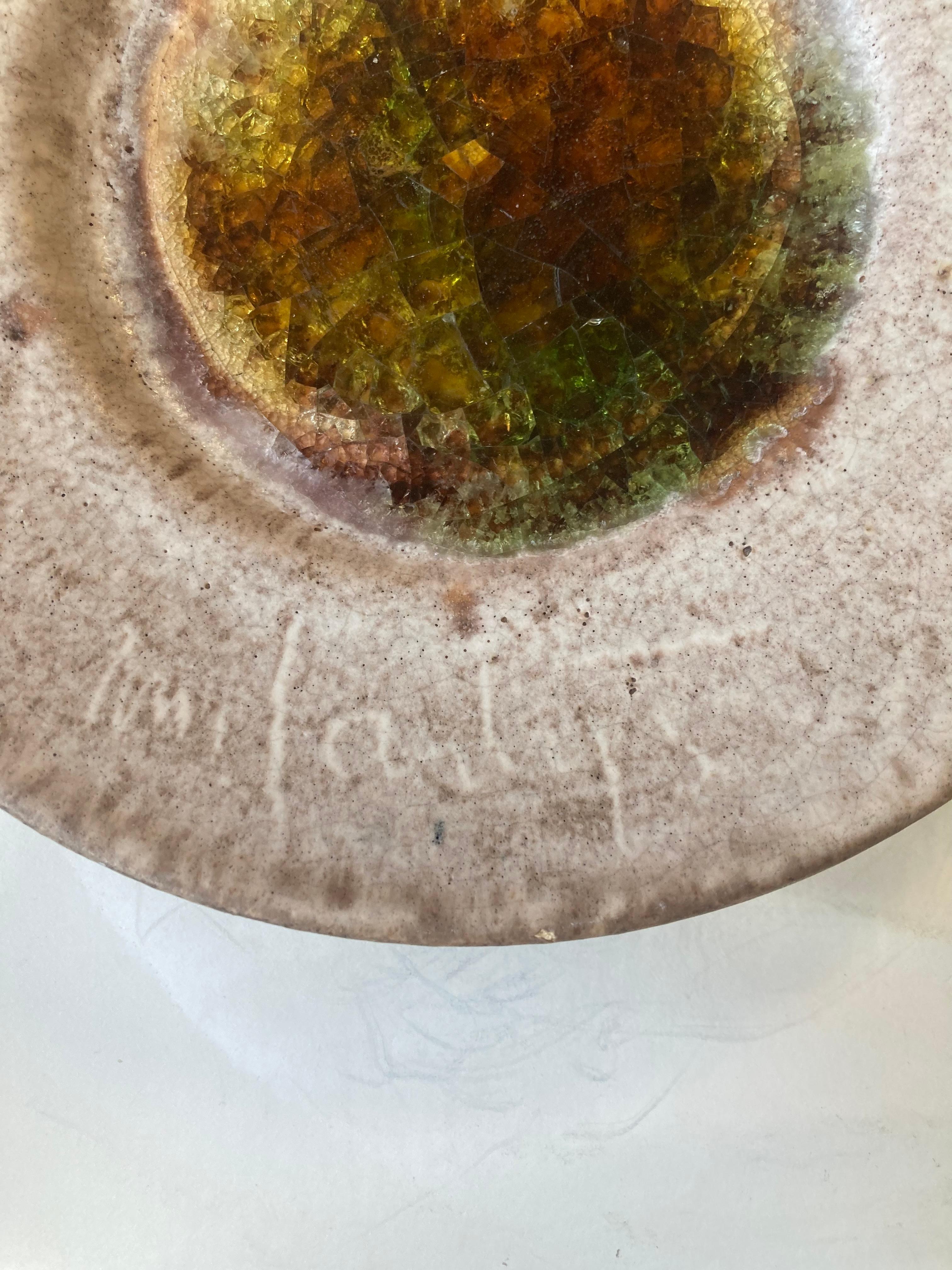 This is a great plate by the well known potter Lee McCarty of Merigold Mississippi . This piece has a crystalized glass glaze, that was called 