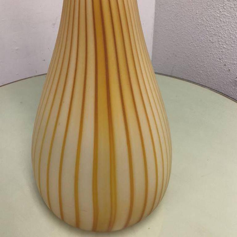 A stunning original piece of Art Glass. This unique piece was created by Lee Miltier of Berkeley California. Lee is the founder of Bohemian Glass Studio in Berkeley. He is very active in the Bay area. He has a great reputation. Lee Miltier was born