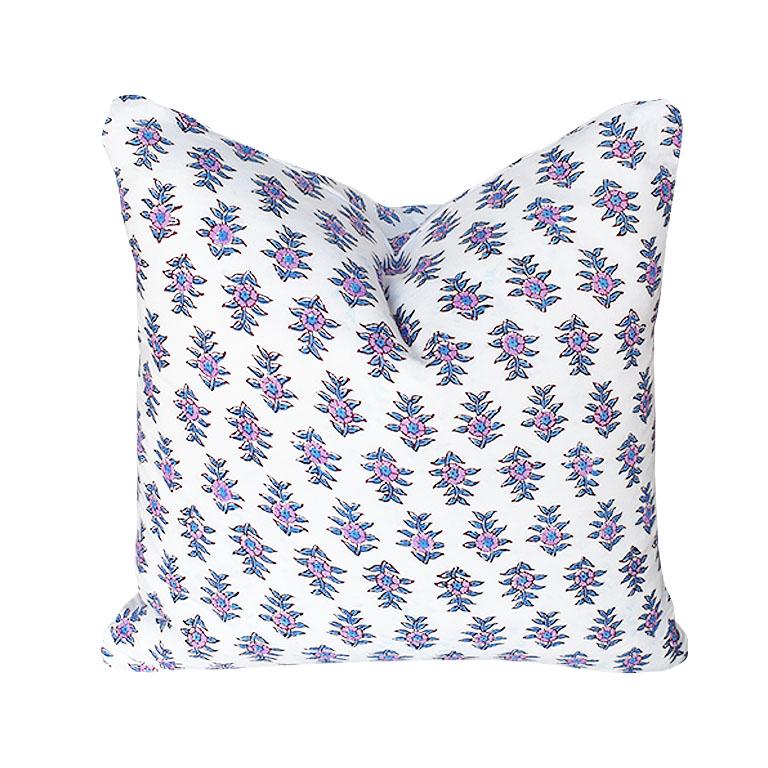 Bring a taste of the orient to any space with one of our custom-created Indian block print pillows. Each pillow is made of soft cotton and hand block printed by our artisans in India. Set on a bright white background, purple and blue block print
