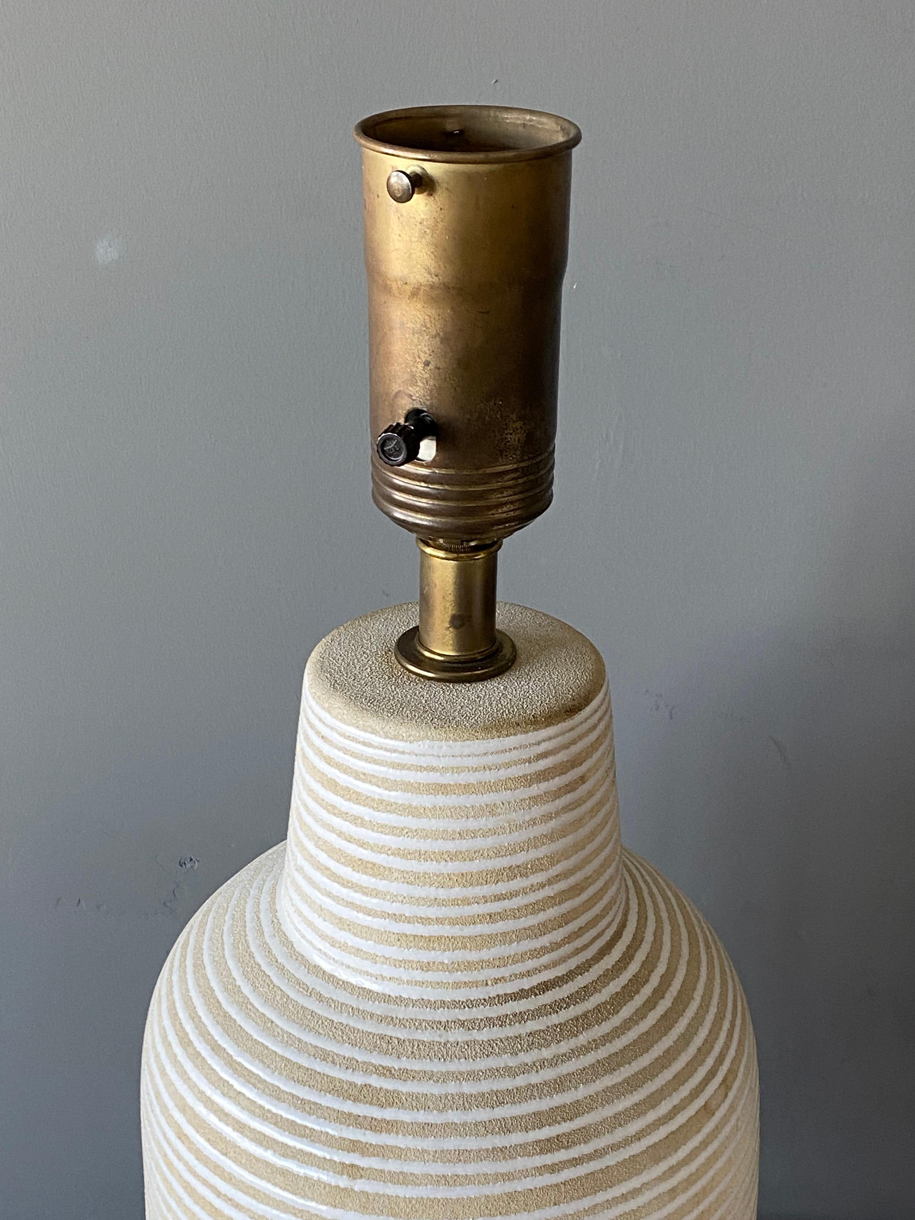 American Lee Rosen, Large Table Lamps, Incised Stoneware, Brass, United States, 1950s