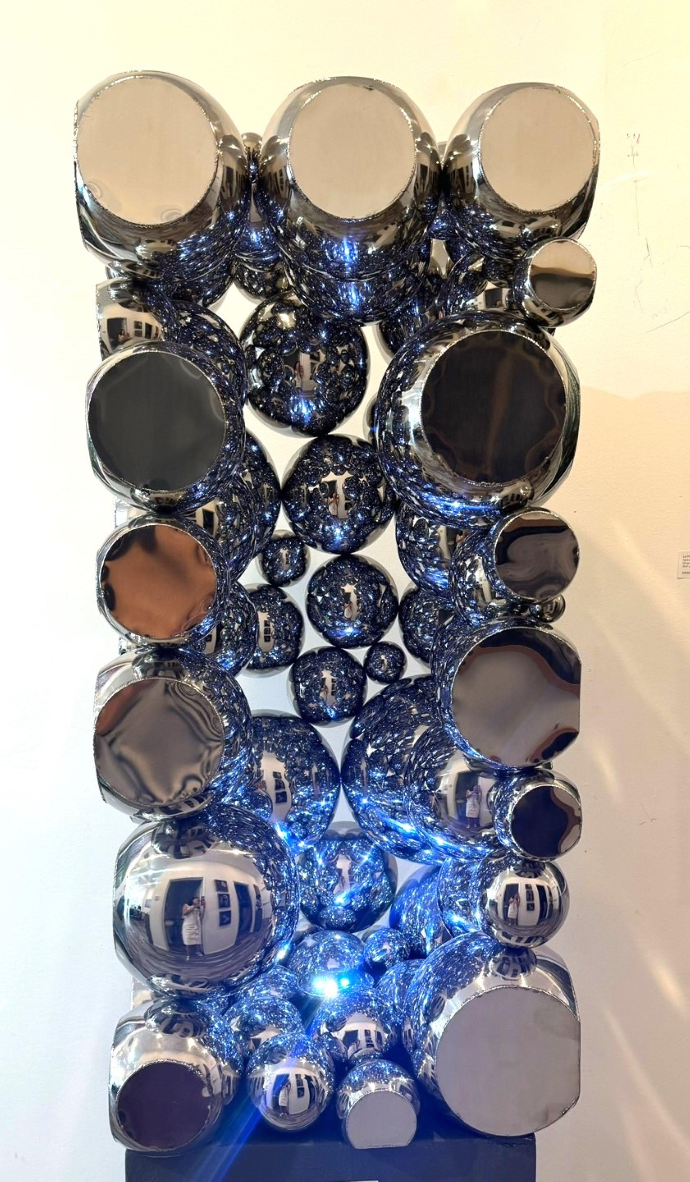 The color of the piece changes with the LED light that is plugged into an outlet.