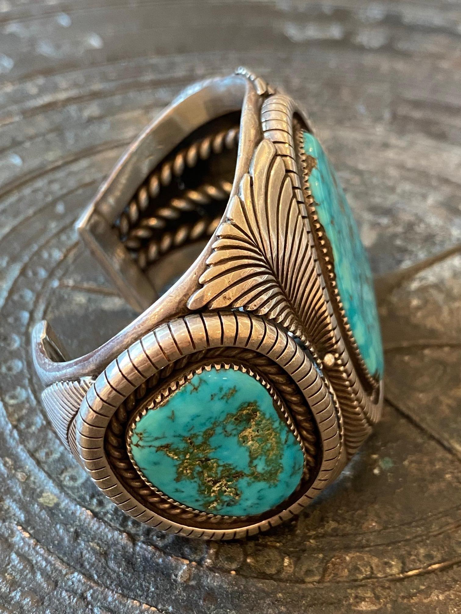 A magnificent, early, Morenci turquoise and sterling silver cuff, by Lee Yazzie (Navajo), circa 1975. 
Stamped Lee Yazzie. 
The inside circumference is 5.50