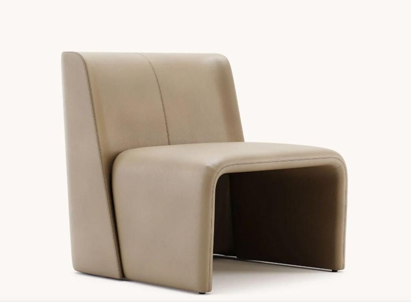 Legacy armchair by Domkapa
Materials: Natural Leather.
Dimensions: W 70 x D 79 x H 75 cm. 
Also available in different materials. 

This stunning armchair is the result of highly innovative solutions attached to functional and cozy shapes,