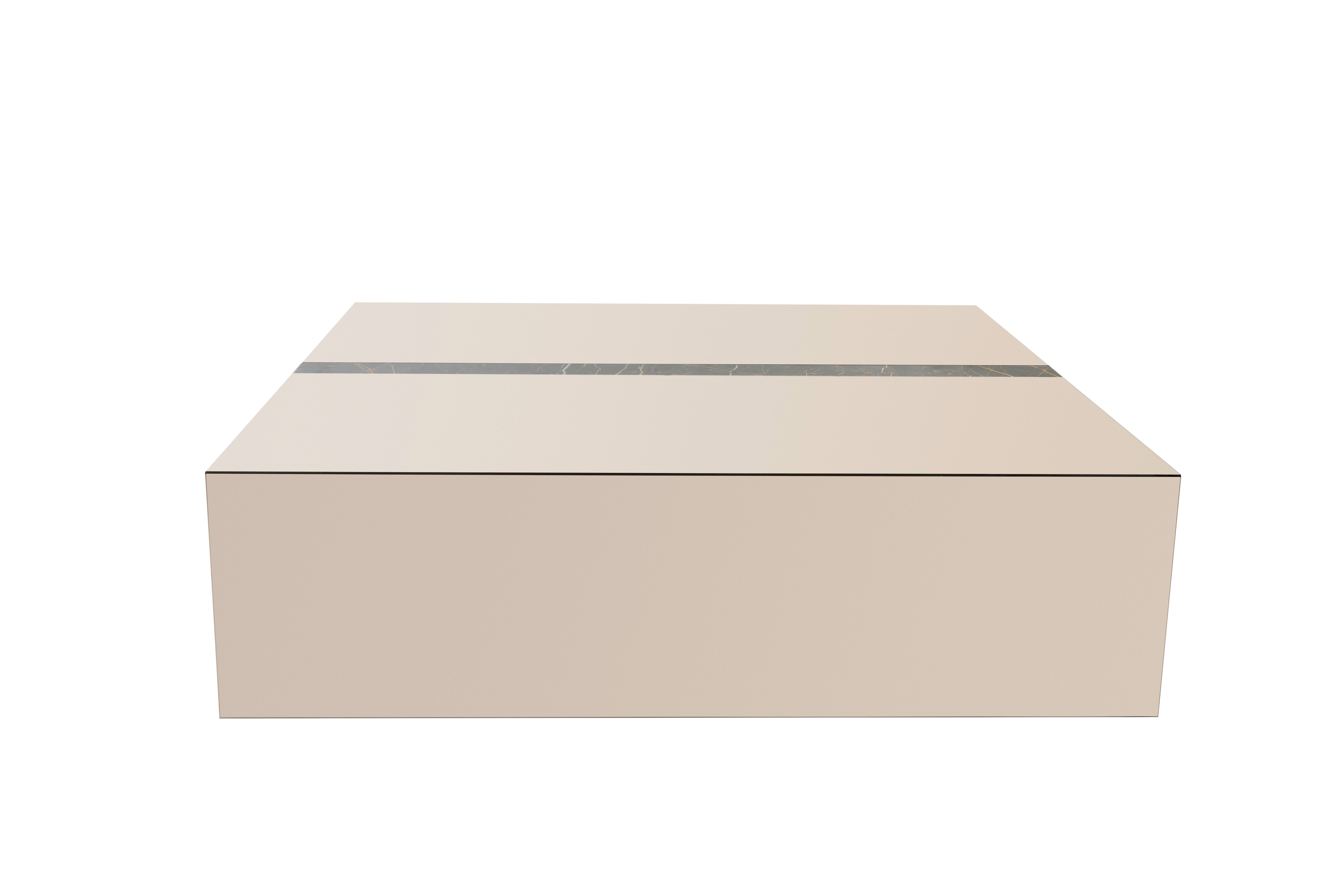 LEGADO is a coffee table made of mirror glass that combines with the natural stone detail.‎ Available in three different sizes, and is possible to customize Legado choosing any mirror and stone of Casa Magna collection.‎

Shown in bronze mirror and