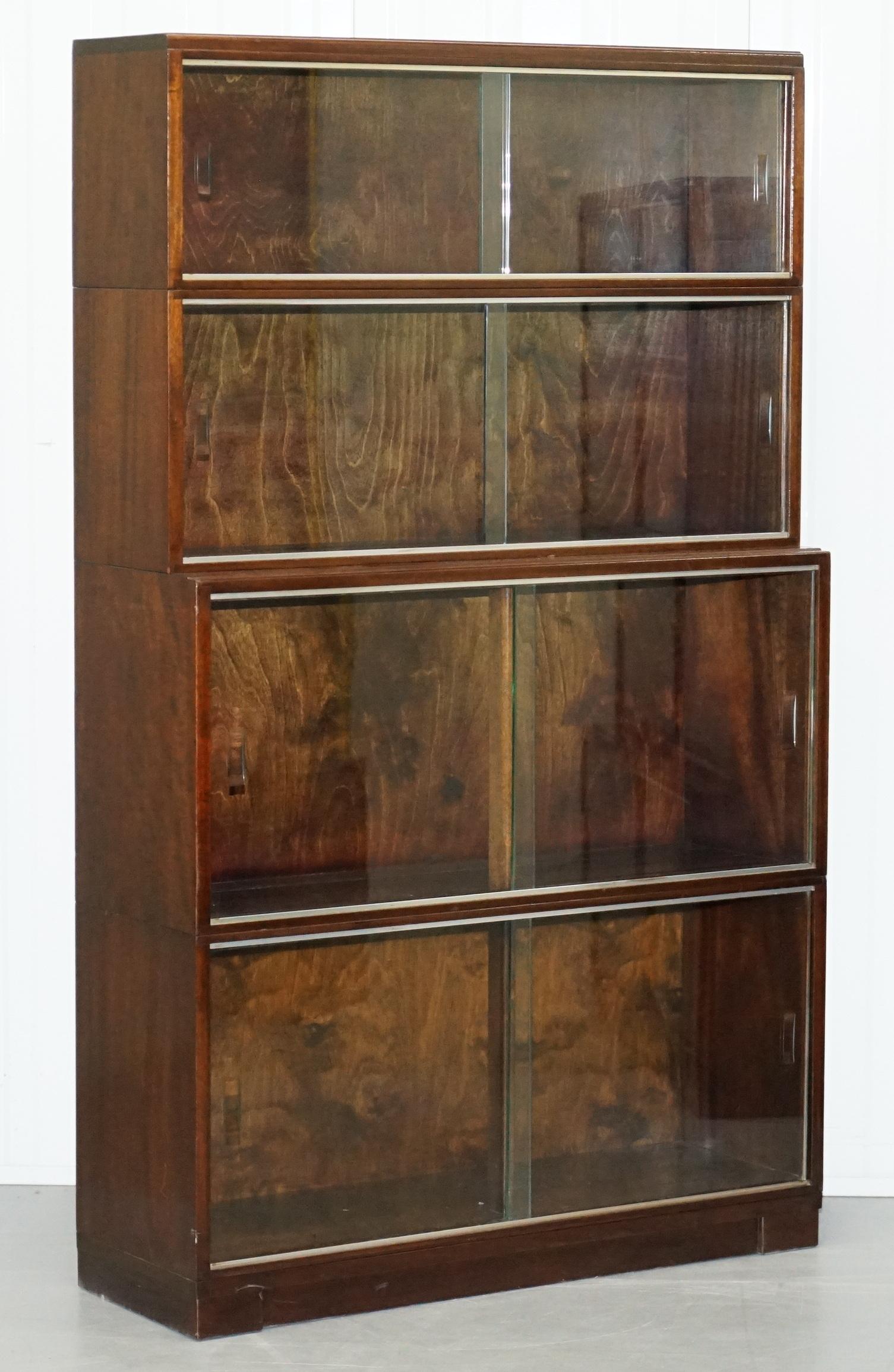 We are delighted to offer for sale this stunning suite of three Minty Oxford Legal modular stacking bookcases with glass doors.

A good looking well made and versatile set, modular bookcases break down into different sections so you can adjust the