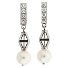 "Legato" Earrings in 18k White Gold with VVS1 E/F brilliants and Akoya pearls.