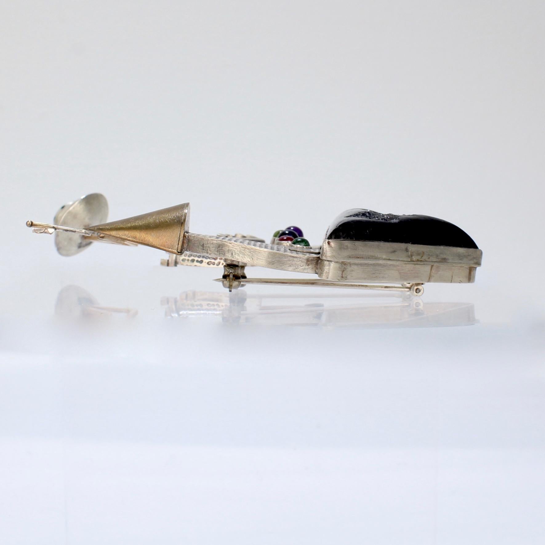 Modern Legend of the UFO, a Gold, Silver and Gemstone Brooch by Yumi Ueno