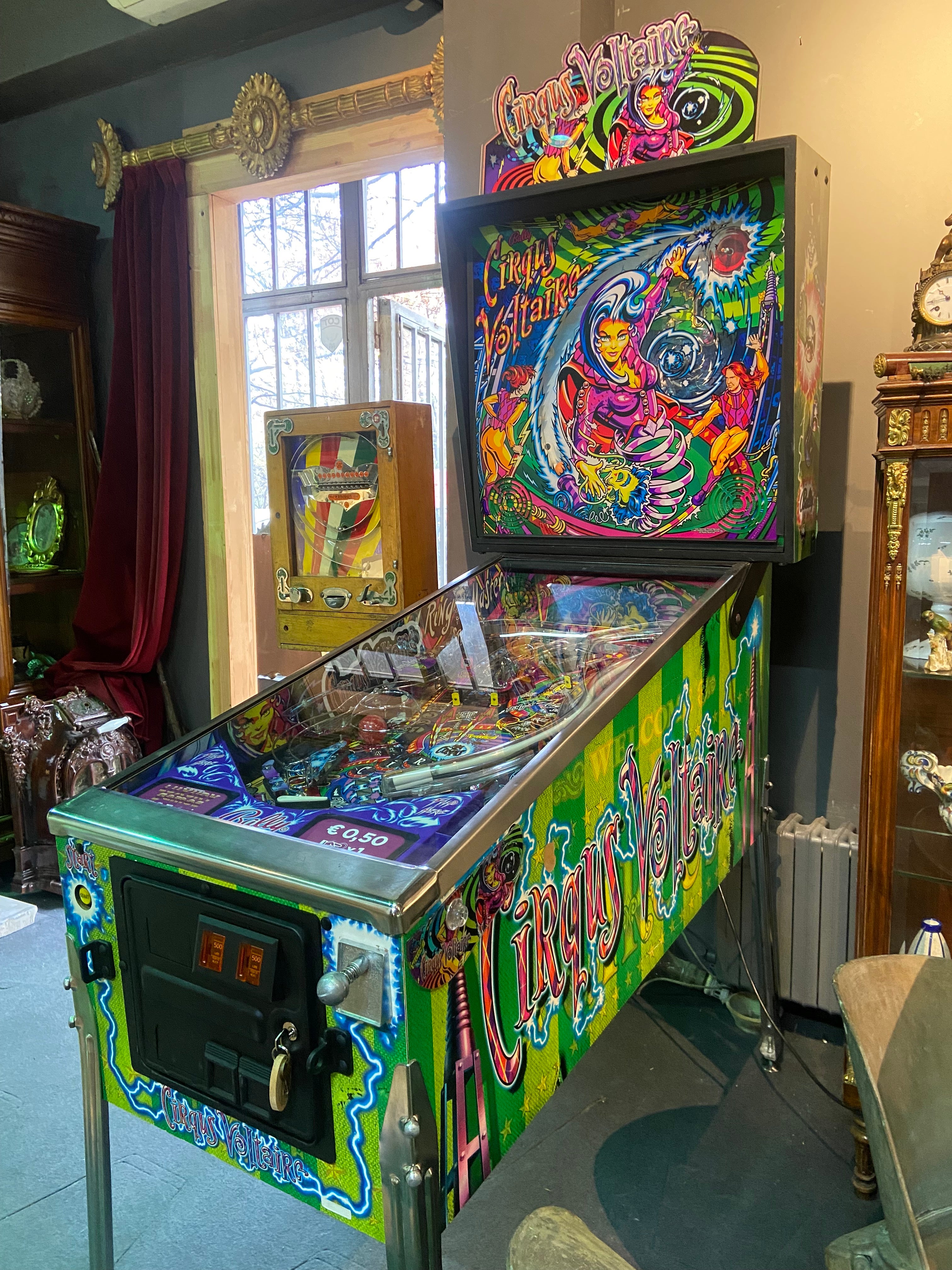 Cirqus Voltaire is a 1997 pinball game, designed by John Popadiuk and Cameron Silver and was released by Williams Electronics Games. The theme involves the player performing many different marvels in order to join the circus. Some of the game's