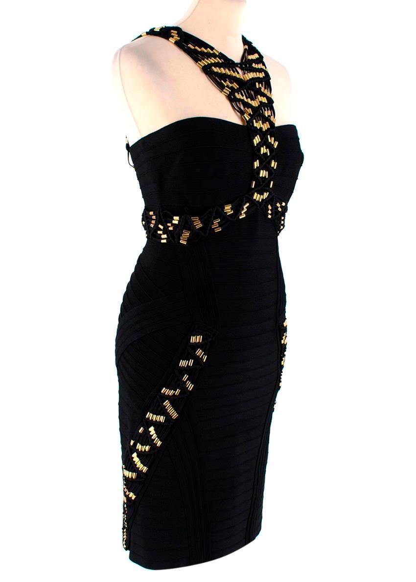 Leger Gold Beaded Black Bandage Alek Dress 

- Black bandage dress
- Gold bond embellishments along straps and chest
- Sculpting ribbed stretchy mid-weight fabric 
- Elasticated strip in chest to prevent slipping 
- Concealed hook and zip fastenings