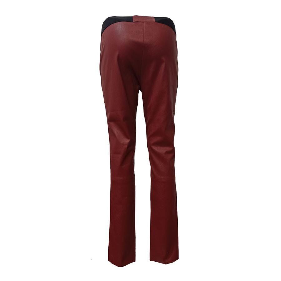 Leather Burgundy color Stretch fabric Total lenght cm 99 (3897 inches) Waist cm 36 (1417 inches) extensible
