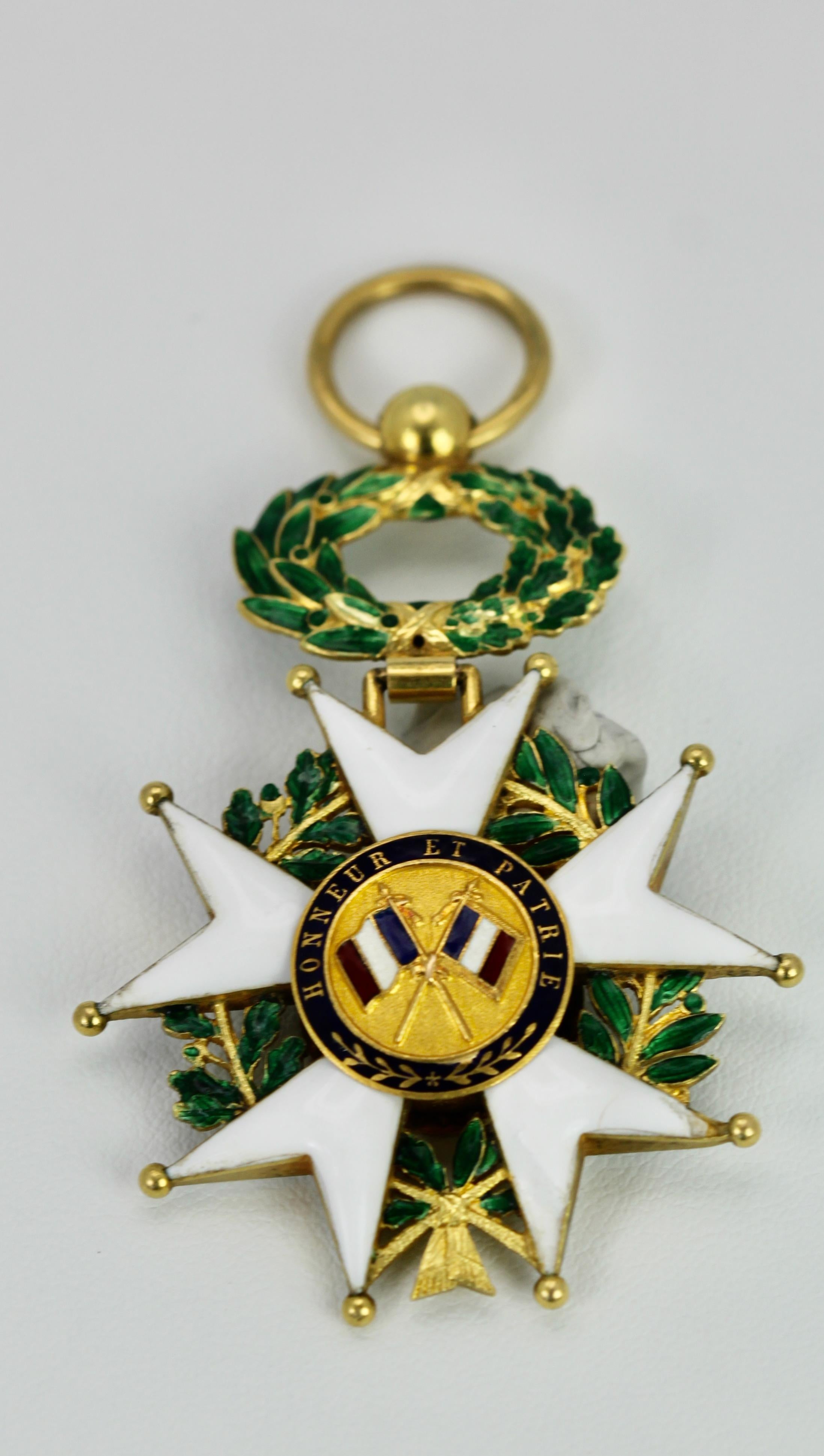 This pendant is rare as most of these medals are in base metal.  This one is done in 18K Yellow Gold and beautifully enameled on both sides as it has a reverse.  This has green, white, red and blue enamel front and back and it is circa 1870.  There