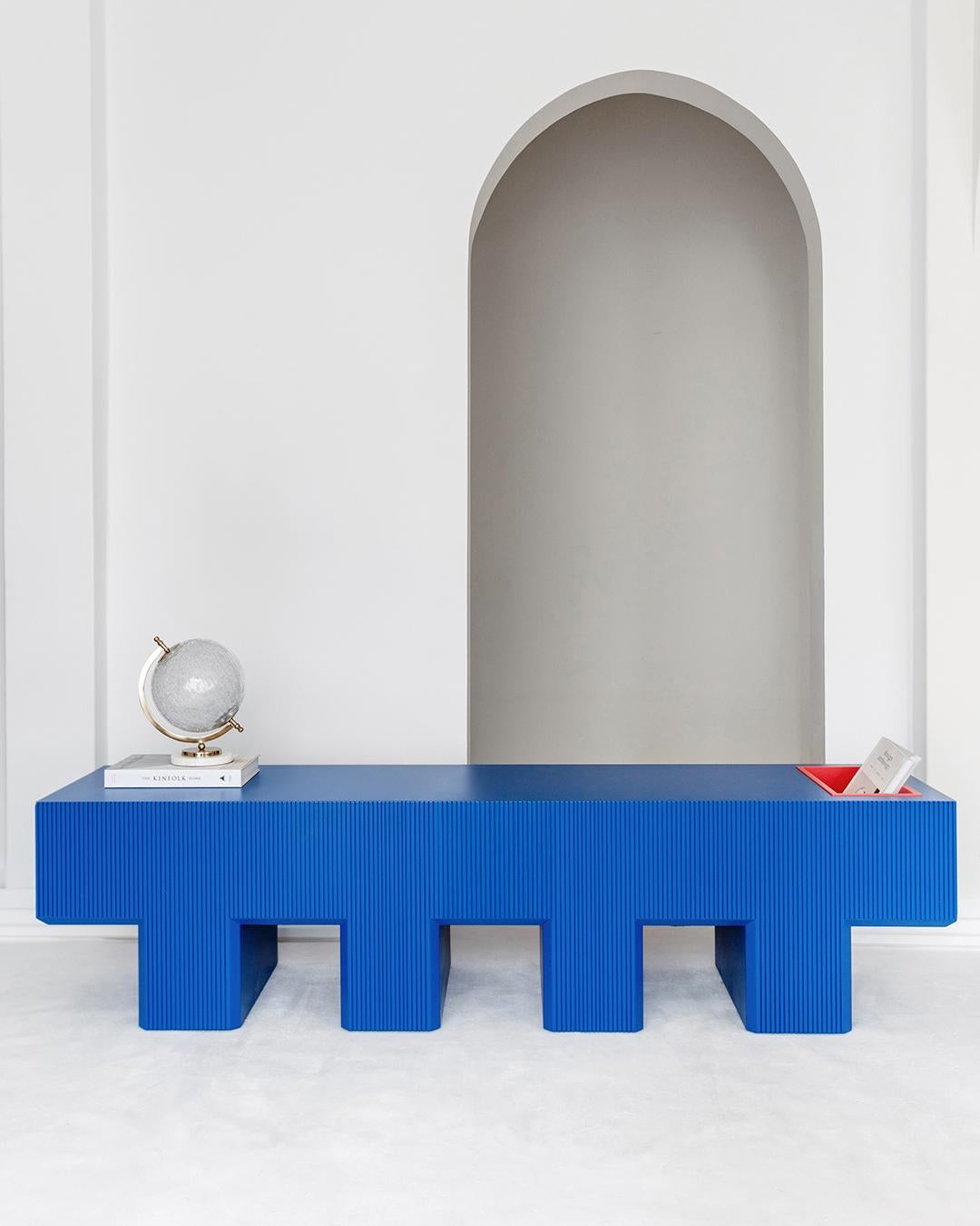 The Lego Bench looks exactly like its name, with several blocky feet that give it an anthropomorphic feel. It’s not only sculptural but practical as you can store your magazines and books in the storage chamber at the end.

Lego Bench brings an