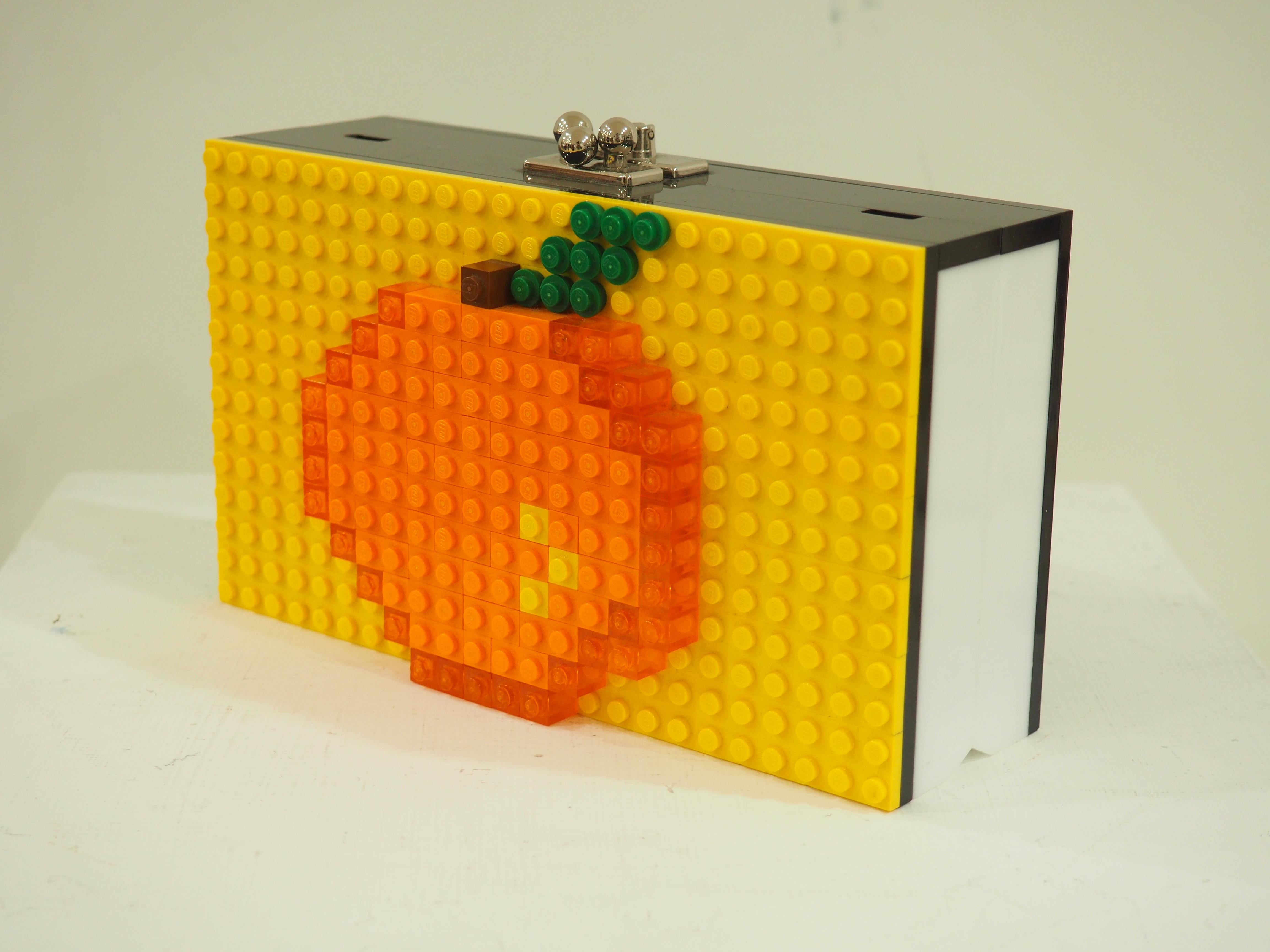 Lego Orange bag
can be used as an handle bag or a shoulder bag