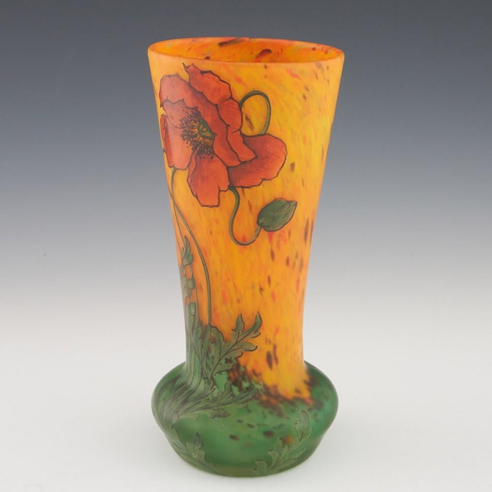 Heading : Legras enamelled poppy vase
Date : c1920
Origin : Saint Denis, Paris
Bowl Features : Mottled blood orange and lemon ground transitioning to green in the base. Enamelled with poppies.
Marks : Enamelled Legras signature
Type : Lead
Size :